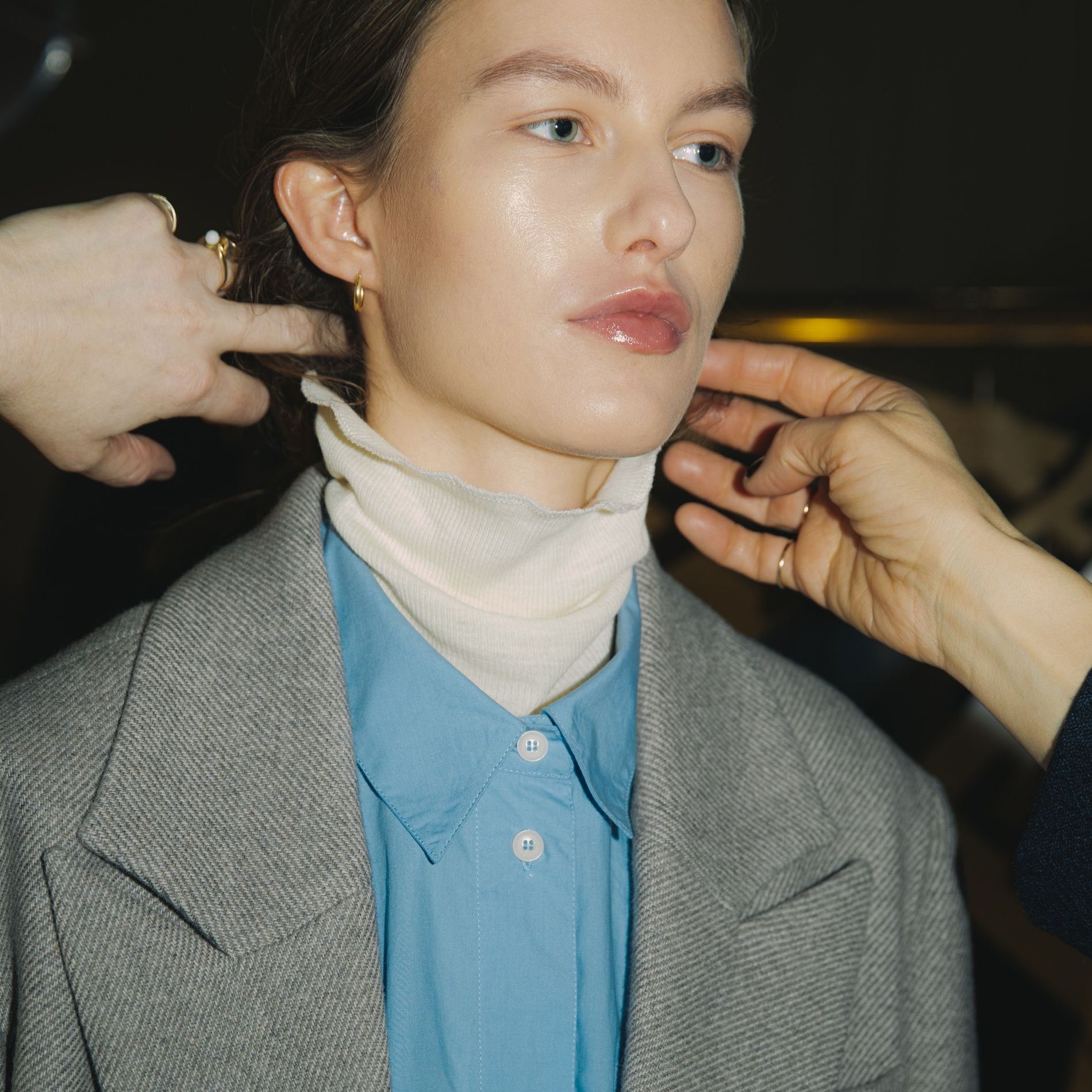 Model wearing luminous foundation backstage at Small Studio's fall/winter 2025 show