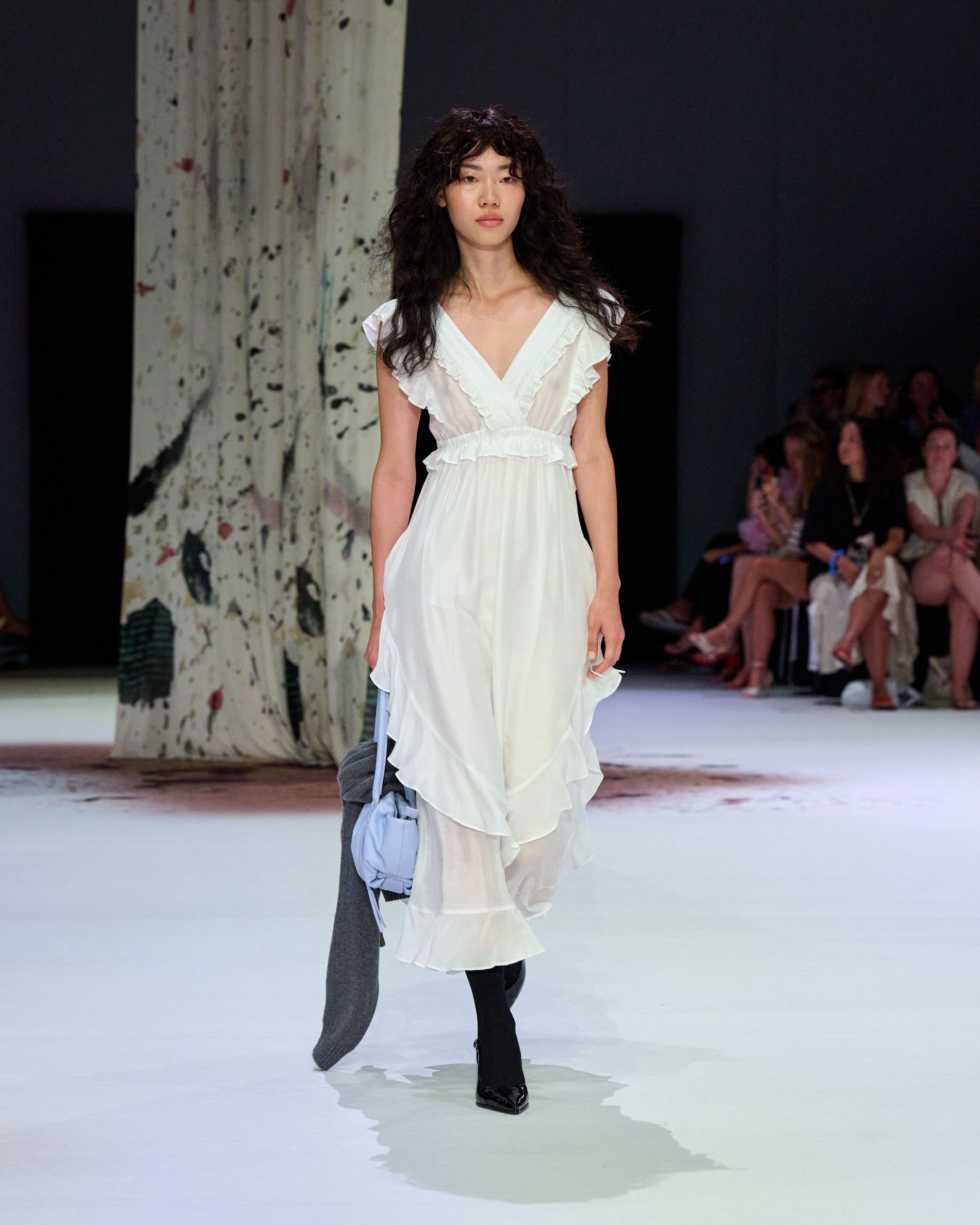 Short sleeved white long flowy dress with ruffels