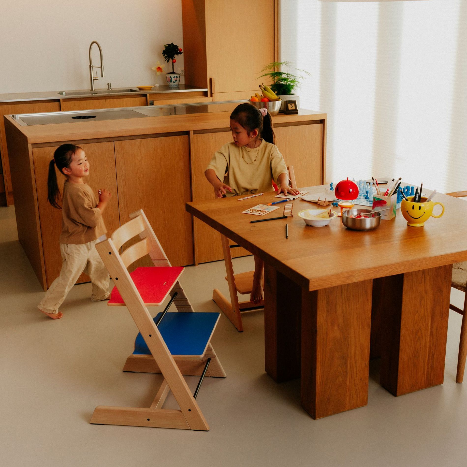 Children playing around the new Tripp Trapp chair