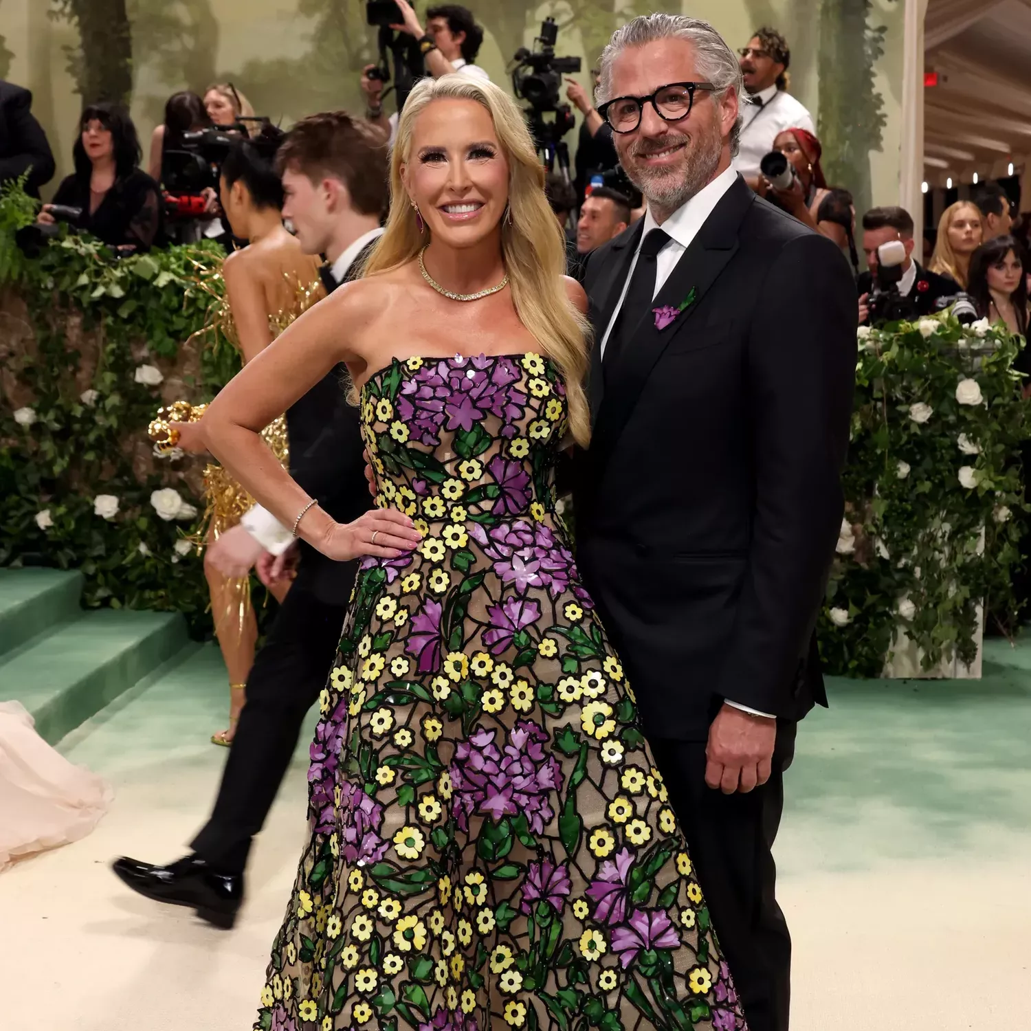 Jenny Chandler in Oscar de la Renta and Casey Wasserman in Zegna