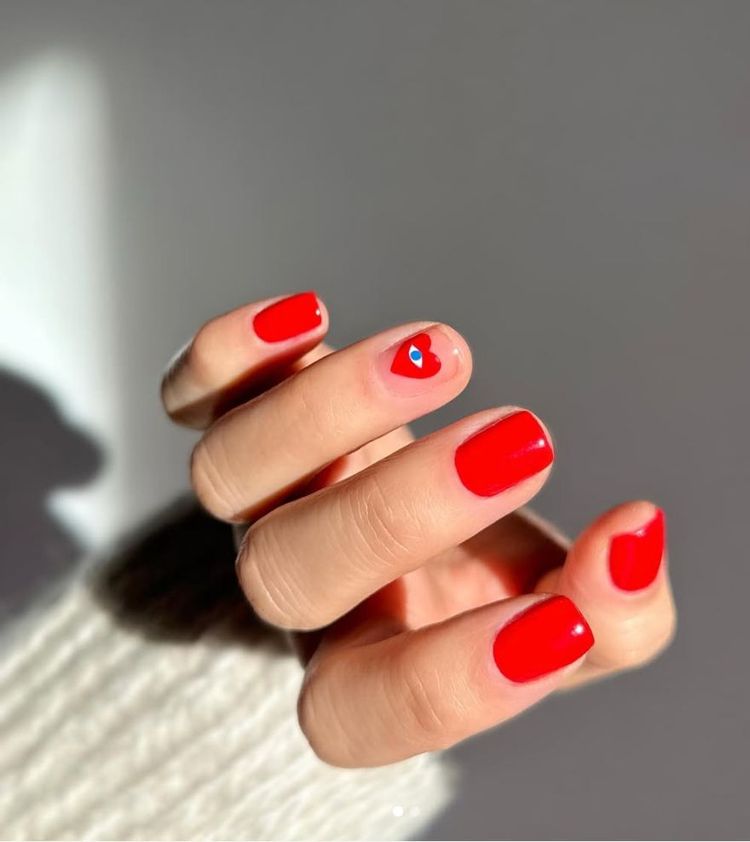 For a more fashionable take on trendy Valentine's Day nails why not recreate Comme De Garçon hearts on your nails?