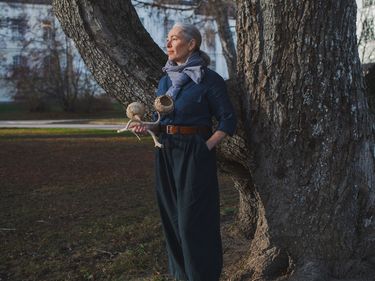 A woman standing in a park