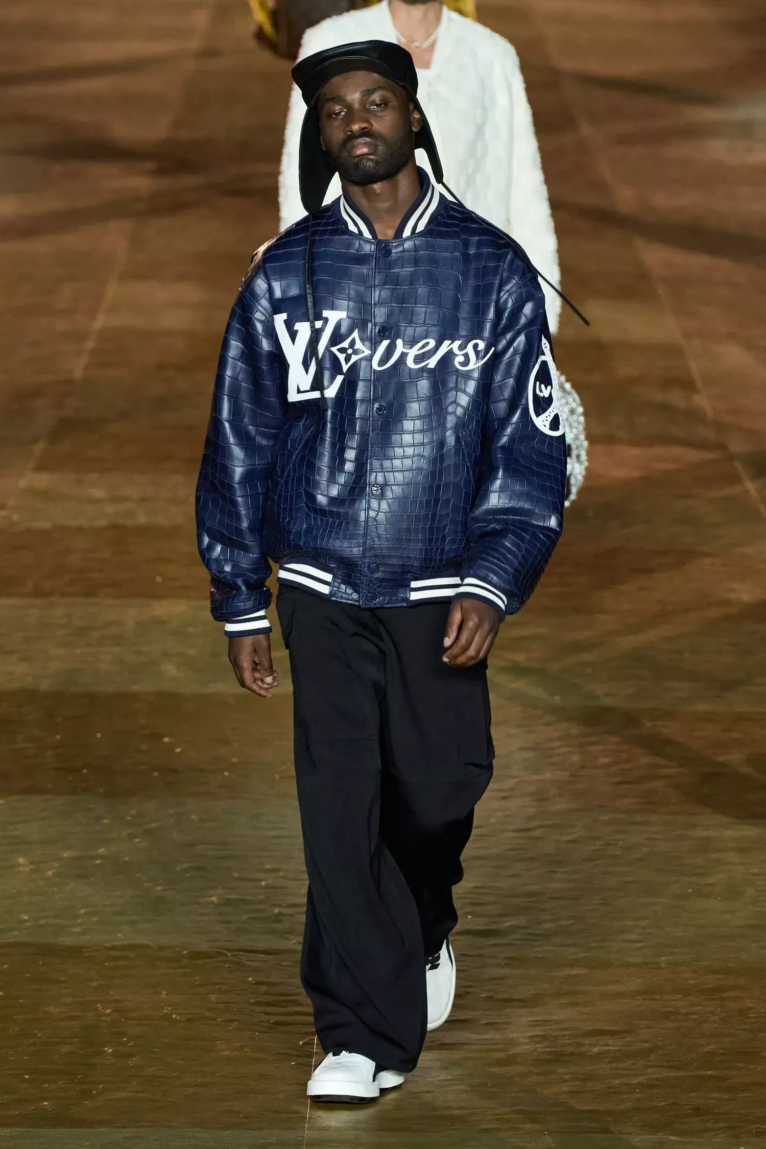 The Daily Herald - Pharrell Williams stages debut for Louis Vuitton on Pont  Neuf