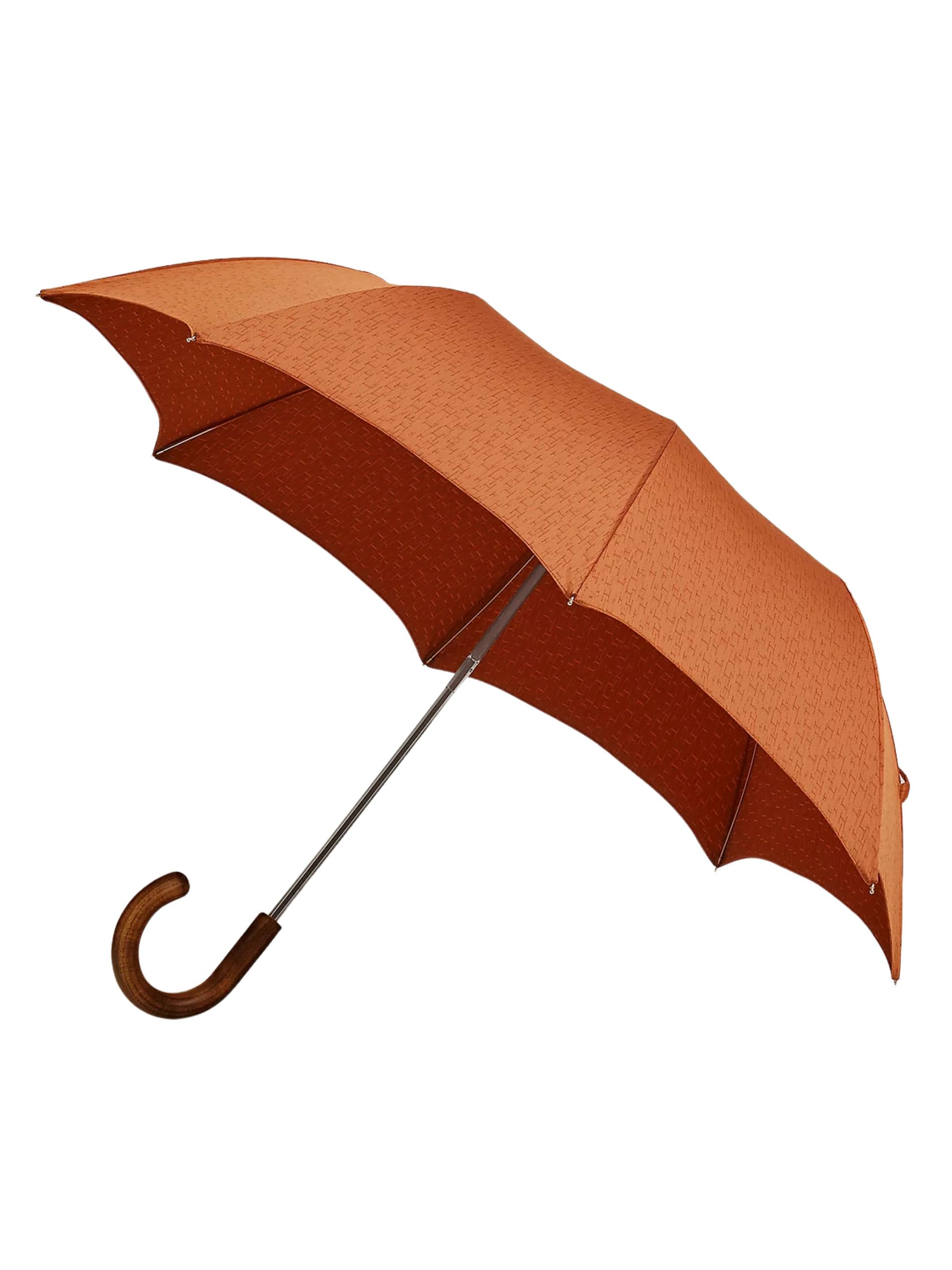 Orange logo umbrella against a white background