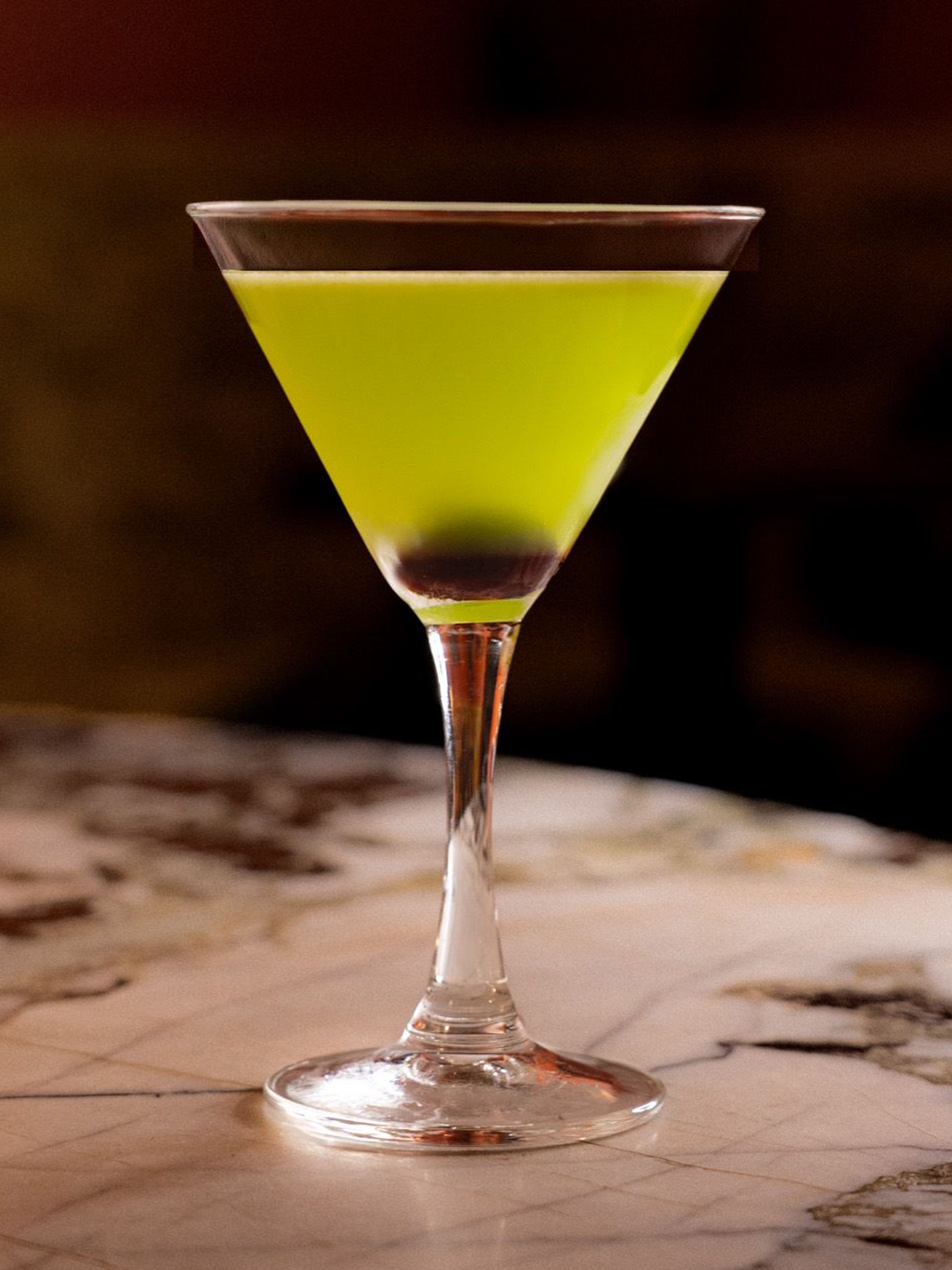 A bright green Halloween cocktail