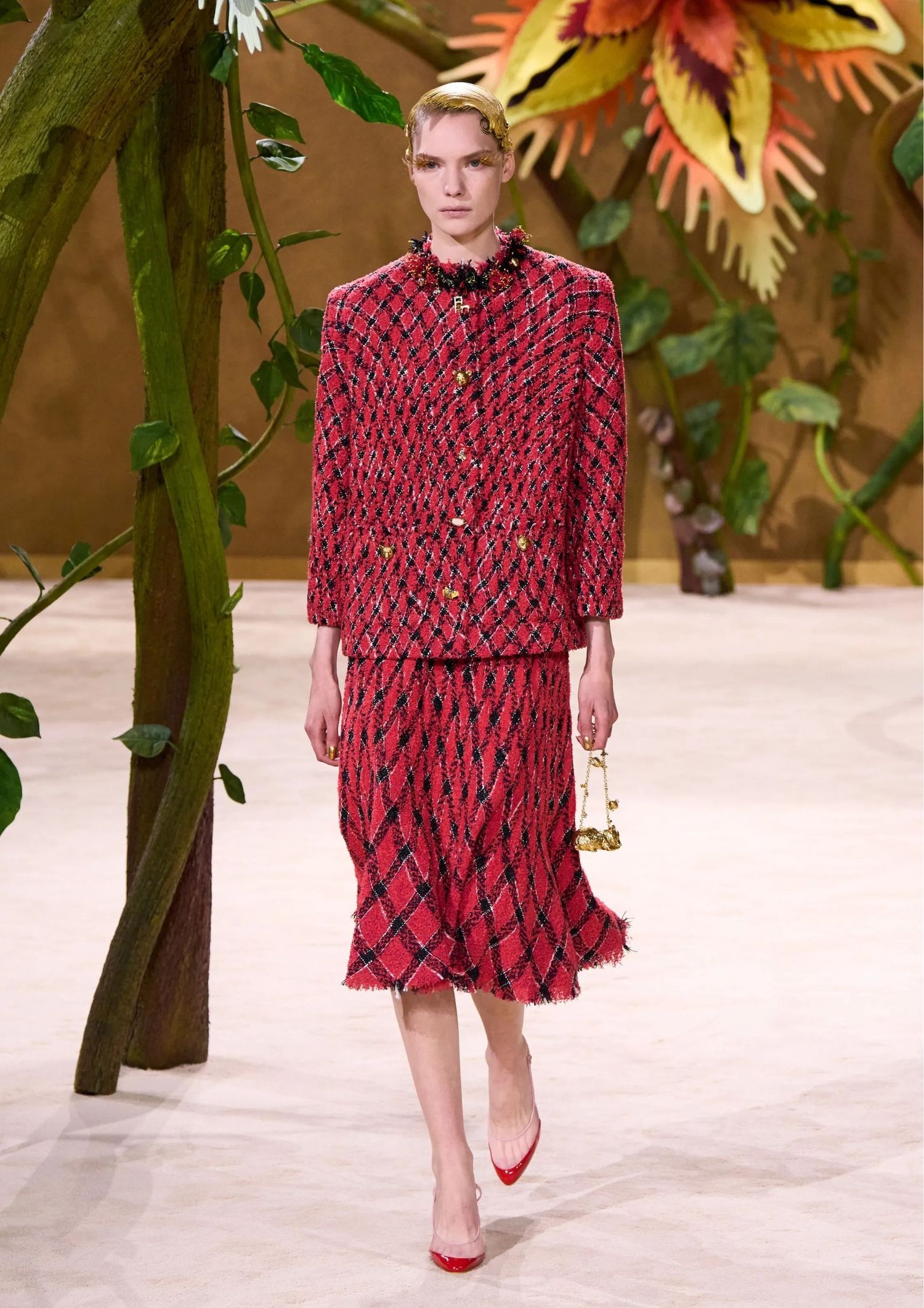 Textured long-sleeved tweed jacket, with a matching midi skirt