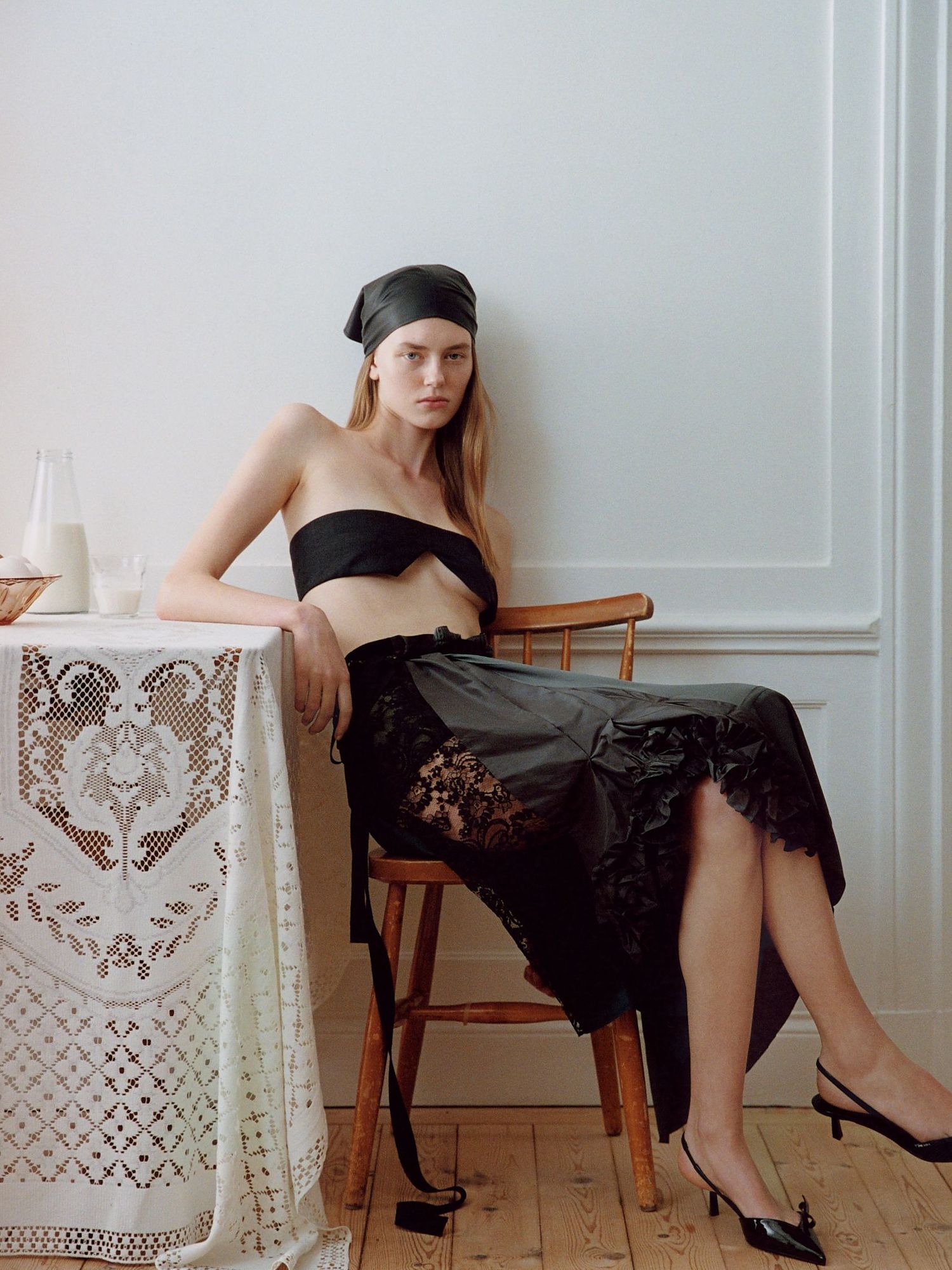 Model poses in lace midi skirt 