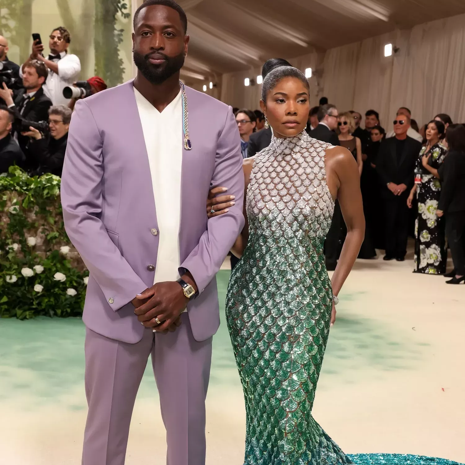 Dwyane Wade in Versace and Gabrielle Union in Michael Kors