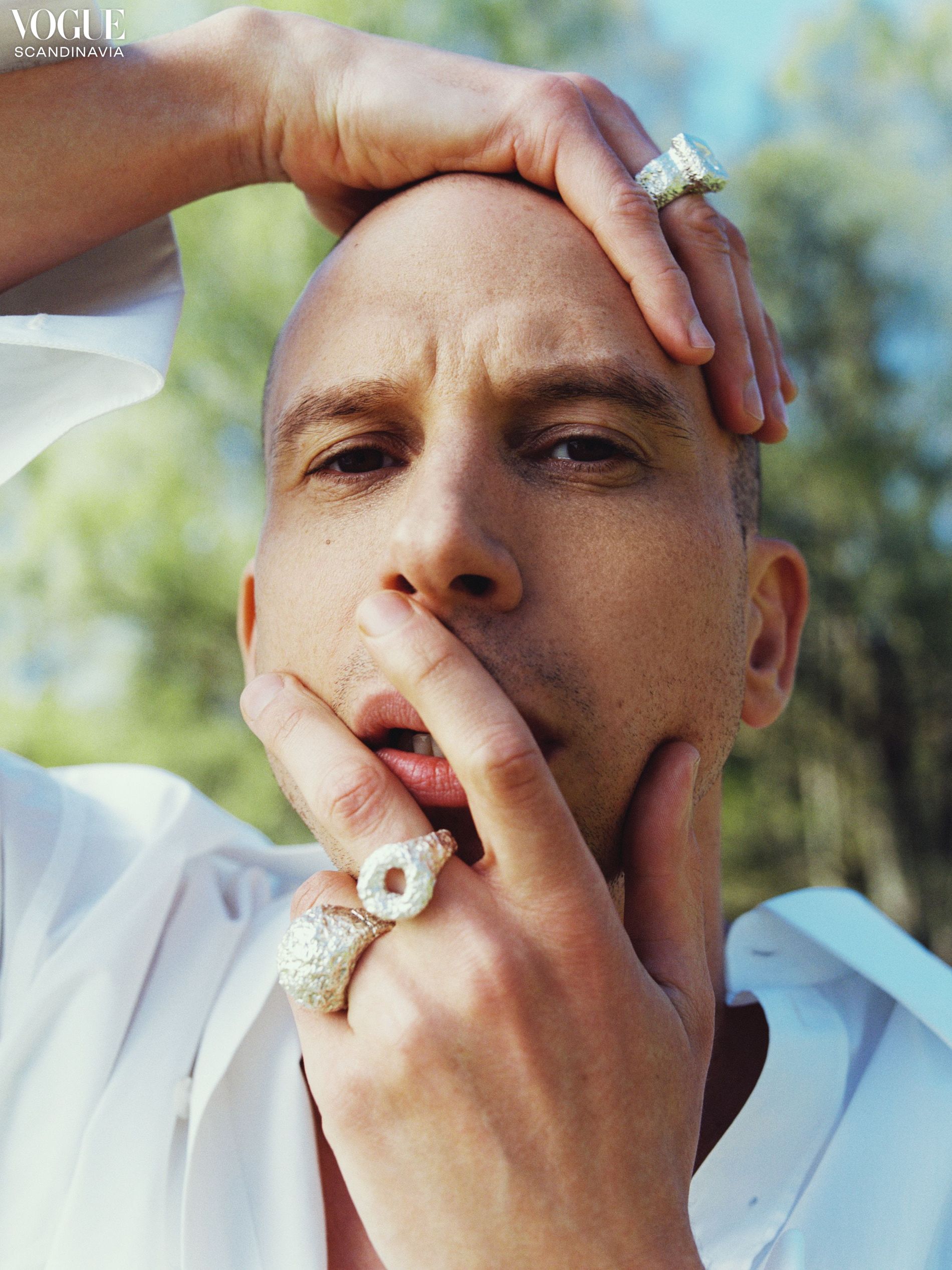 Herbert is wearing white shirt and silver rings