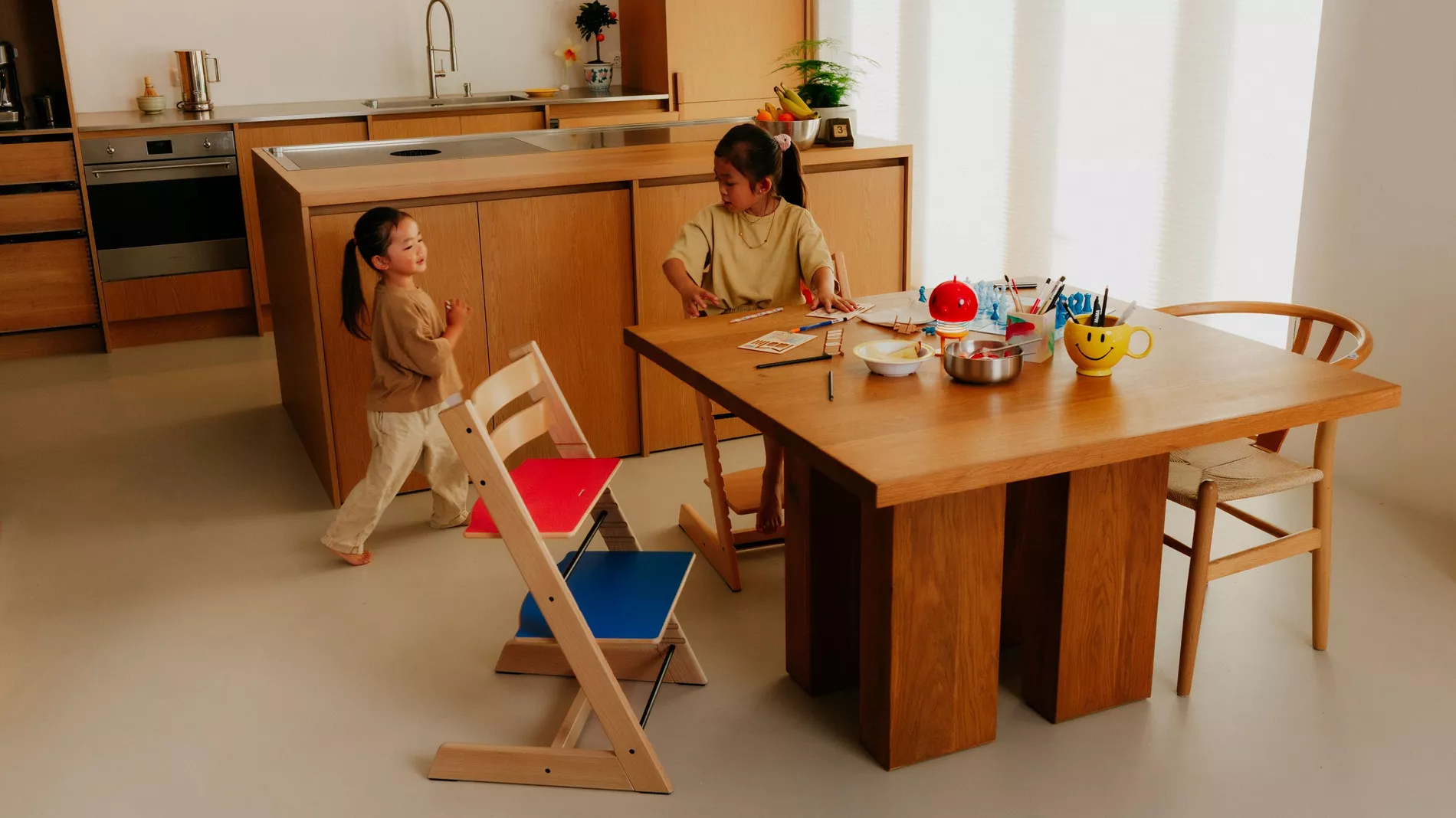 Children playing around the new Tripp Trapp chair