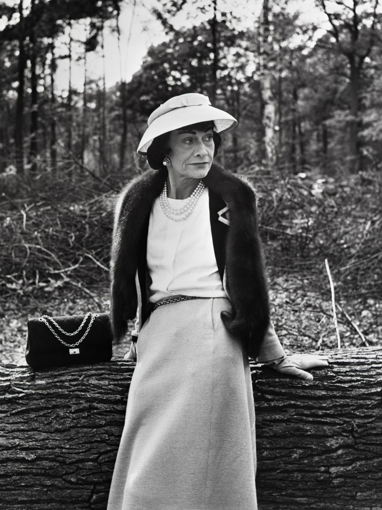 Archive photo of Gabrielle Chanel from 1957 with the 2.55 bag