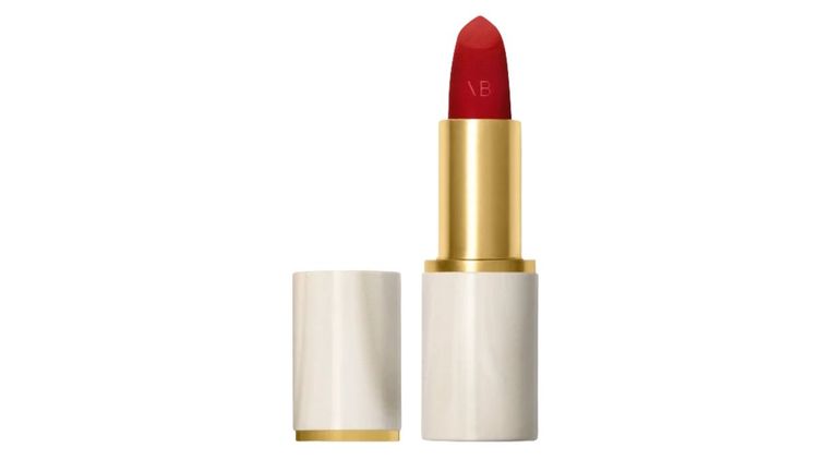 A victoria beckham lipstick in red on a white background