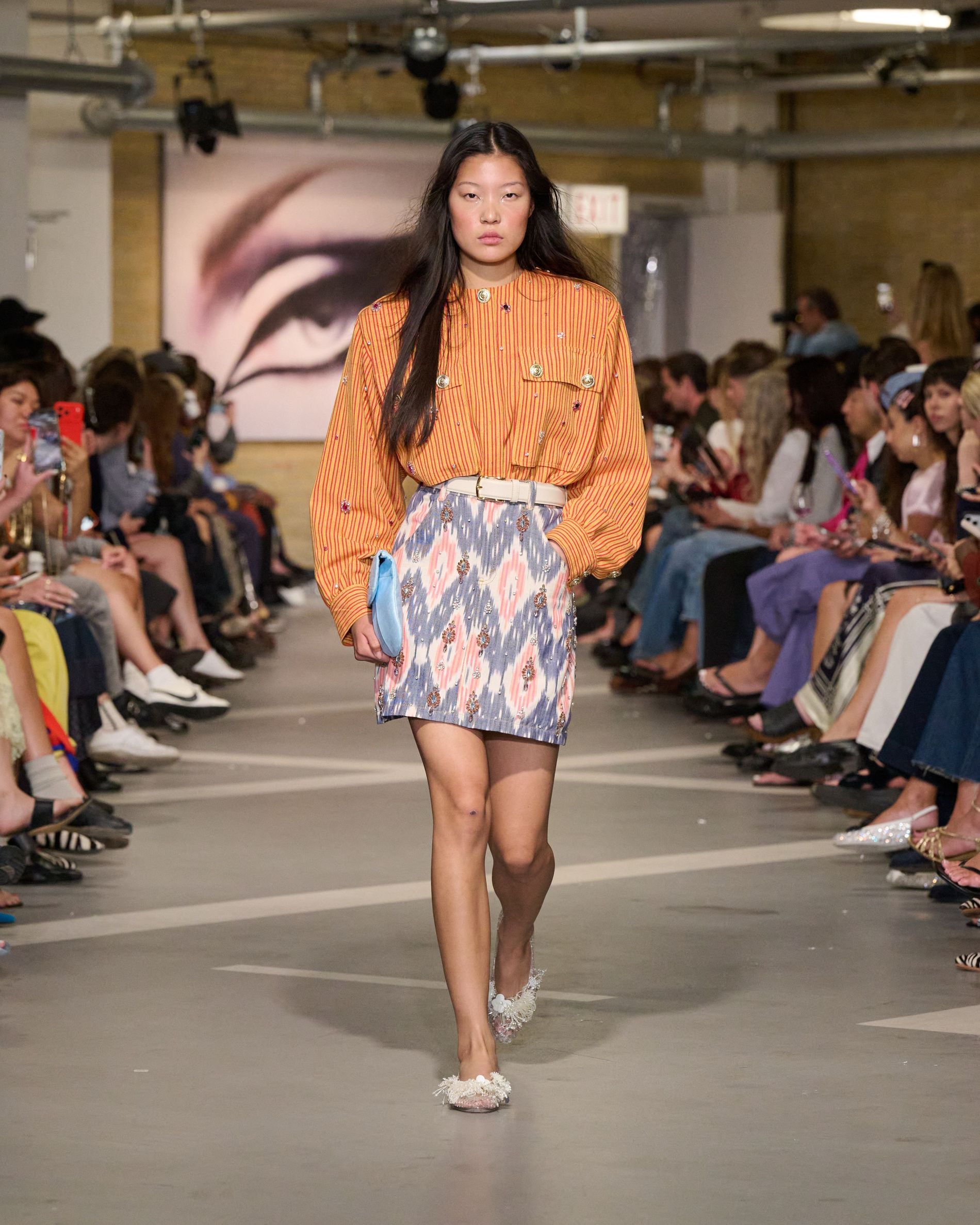 Orange striped jacket and a mid printed skrit