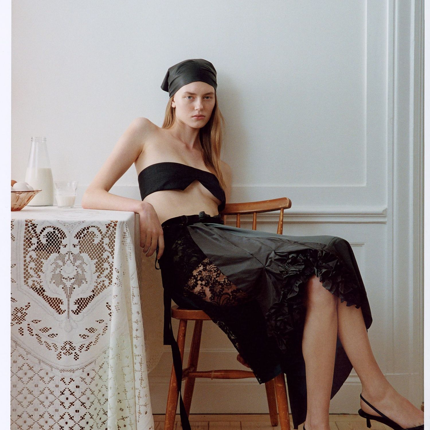 Model poses in lace midi skirt 