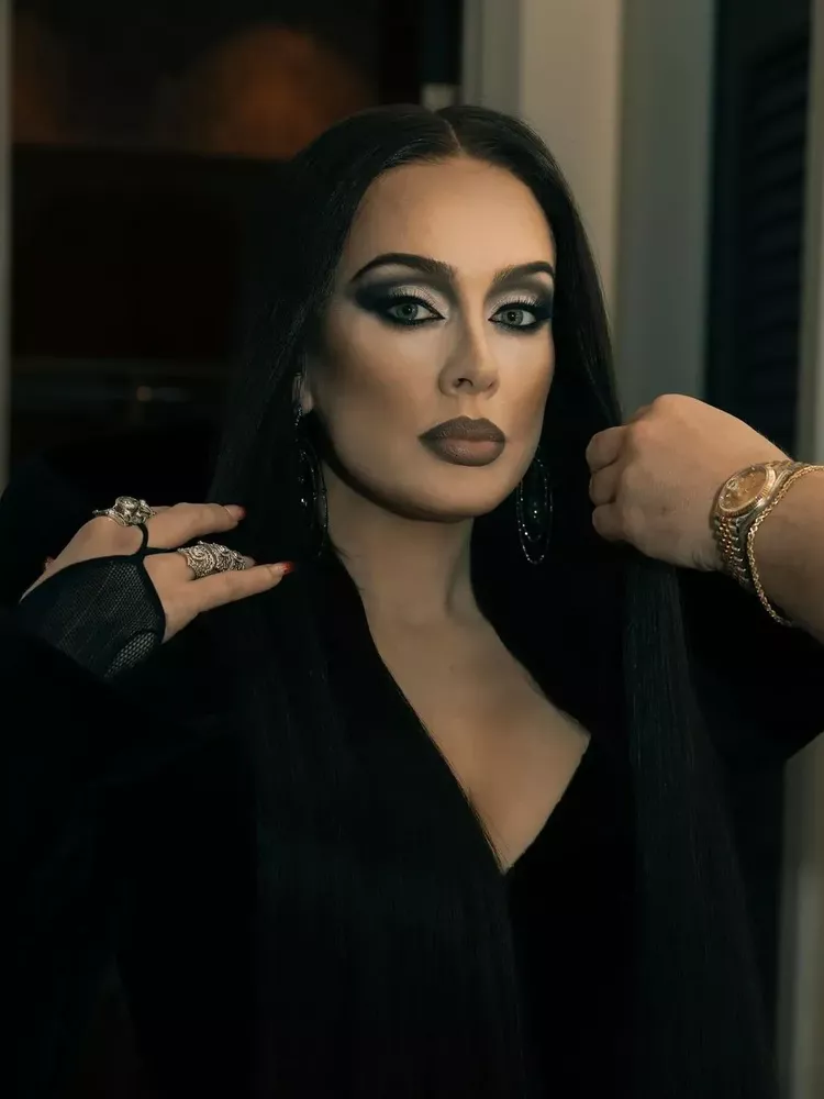 Adele dressed up as Morticia from The Addams Family.