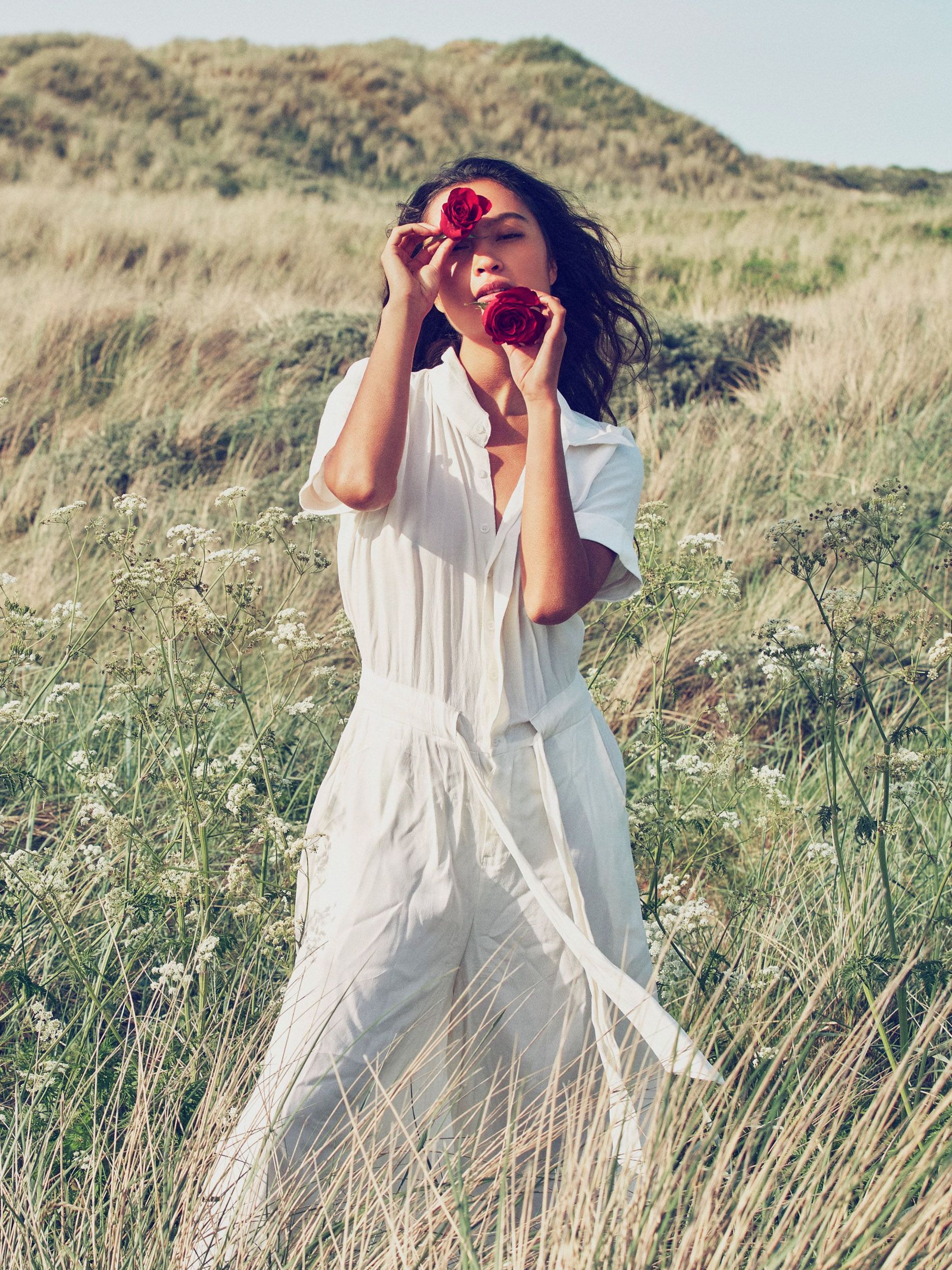 Victoria Melendez cruz with roses field rose white jumpsuit