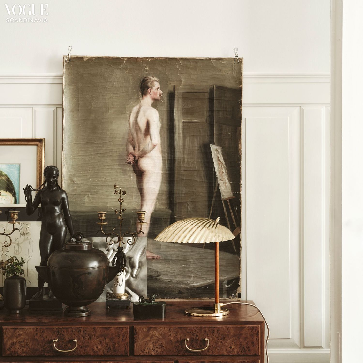 A table lamp on a wooden cupboard