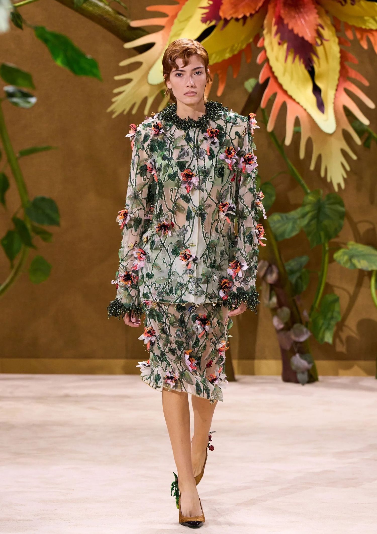 Sheer floral dress with long sleeves and flower embellishments