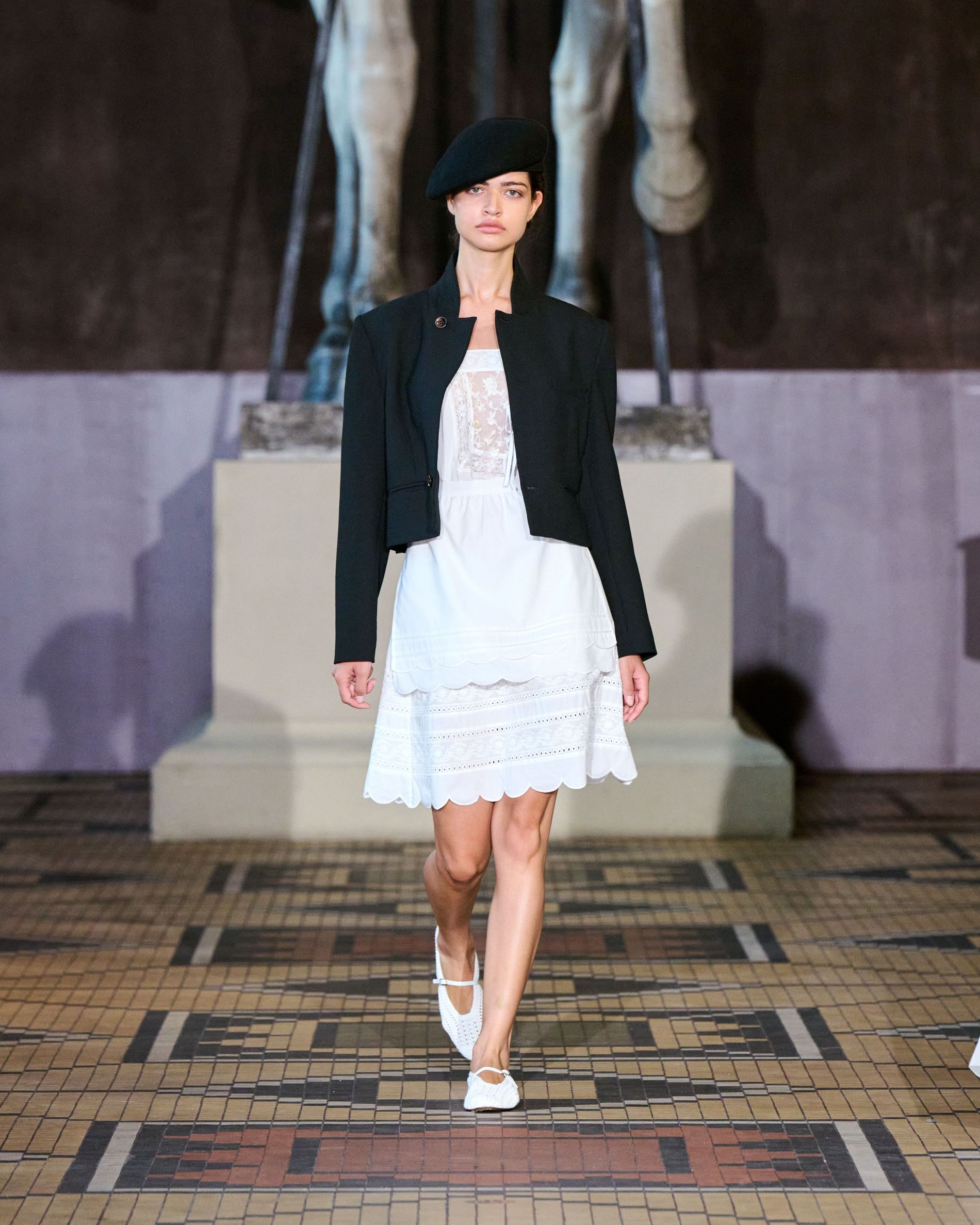 White knee length dress with a black short blazer