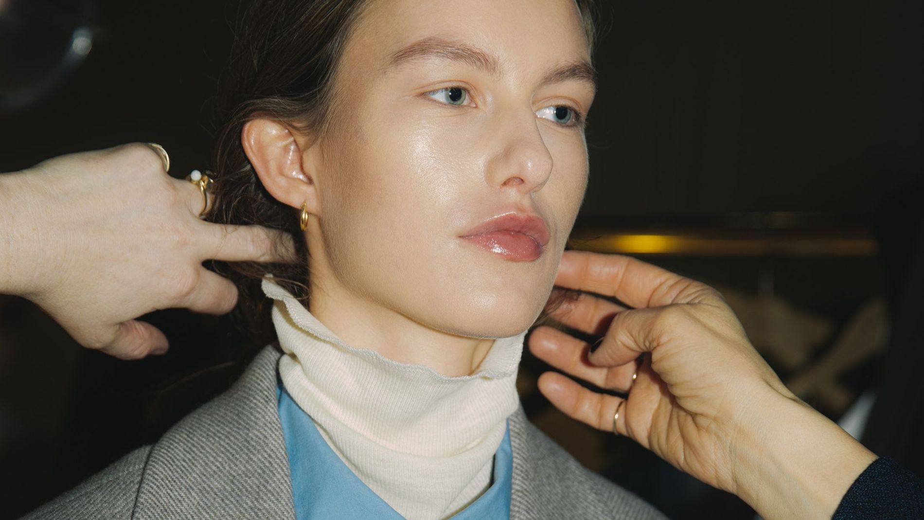 Model wearing luminous foundation backstage at Small Studio's fall/winter 2025 show