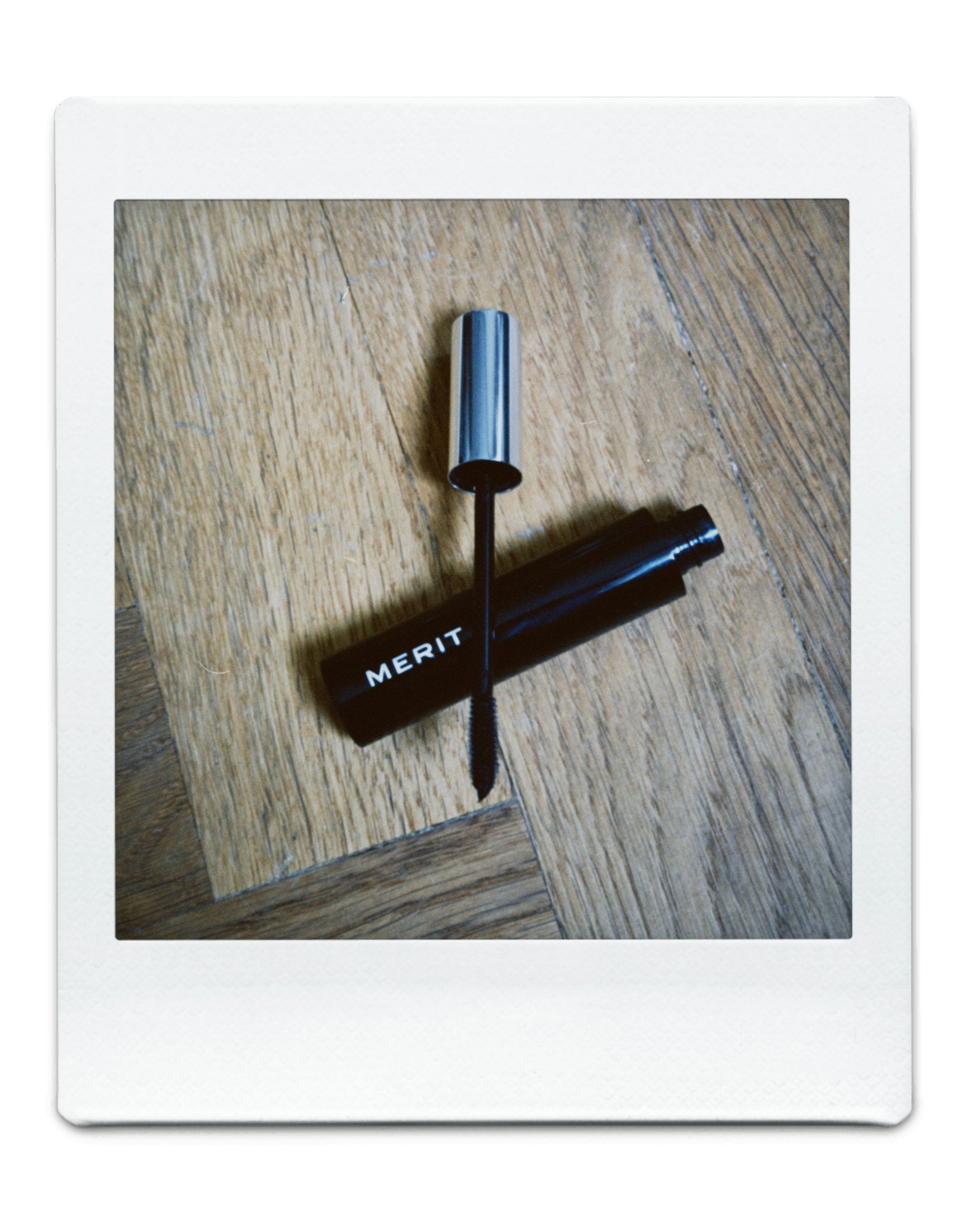 Black mascara with white text