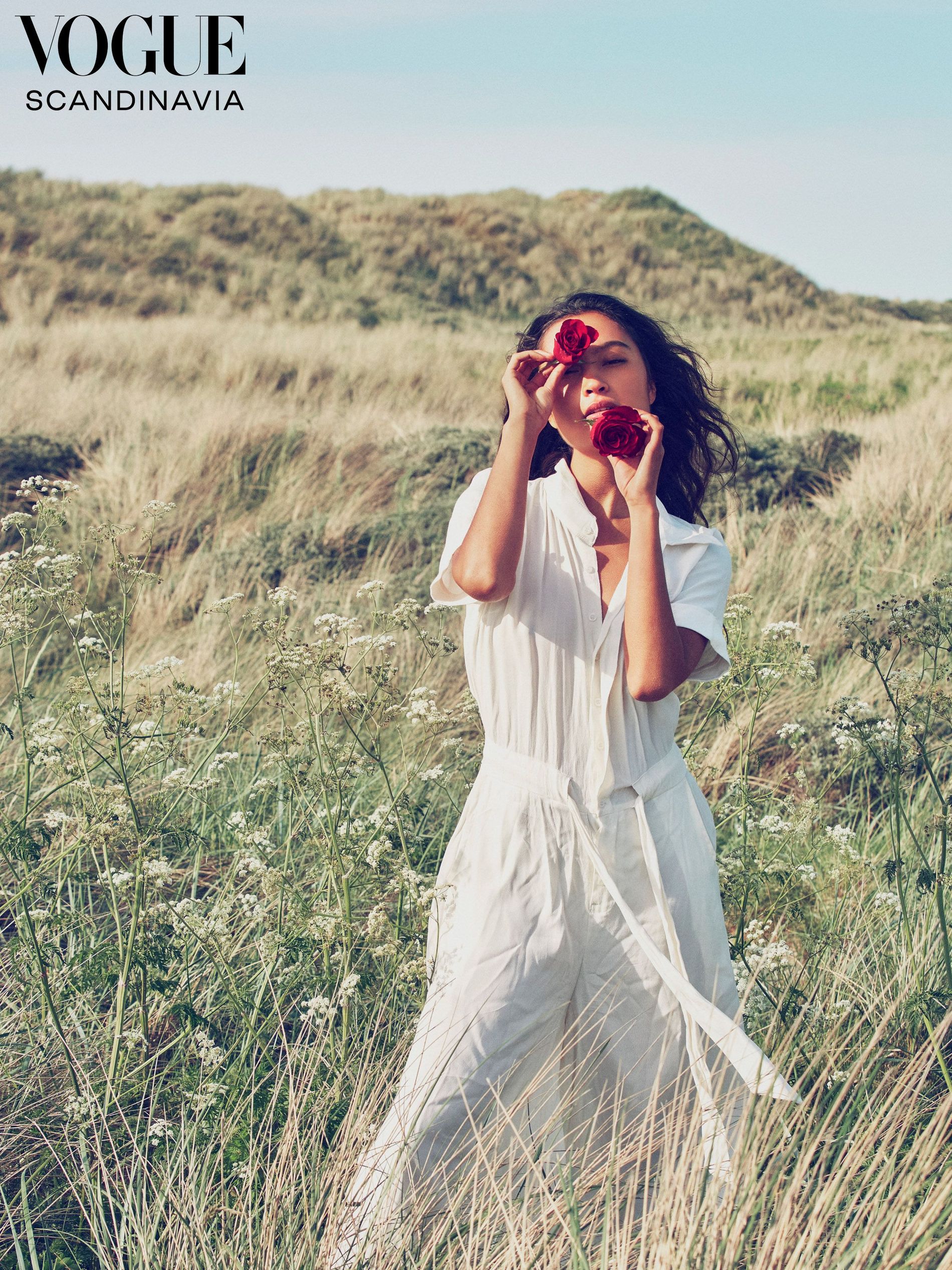 Victoria Melendez cruz with roses field rose white jumpsuit