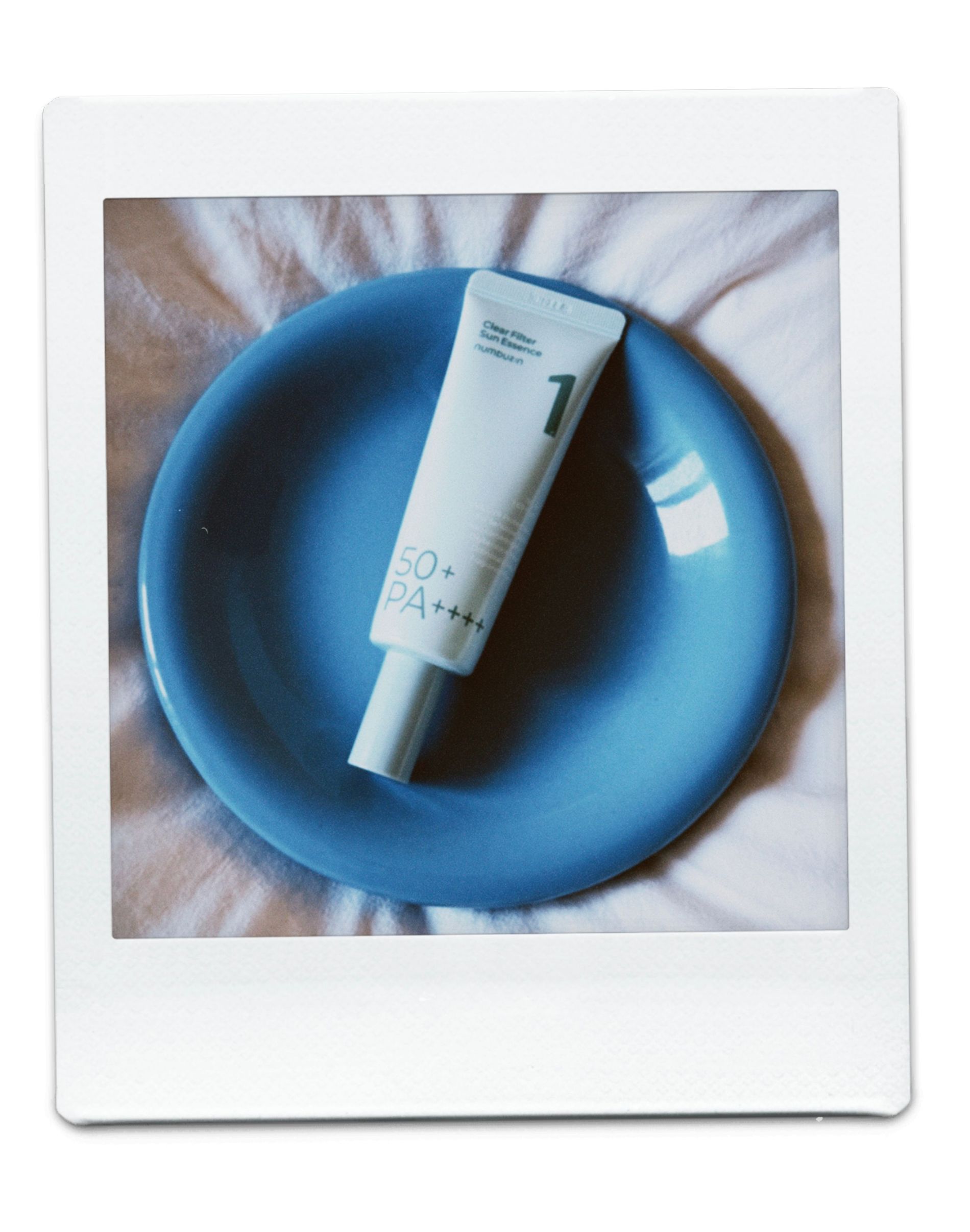 The best clear sun essence - Numbuzin - On a white background