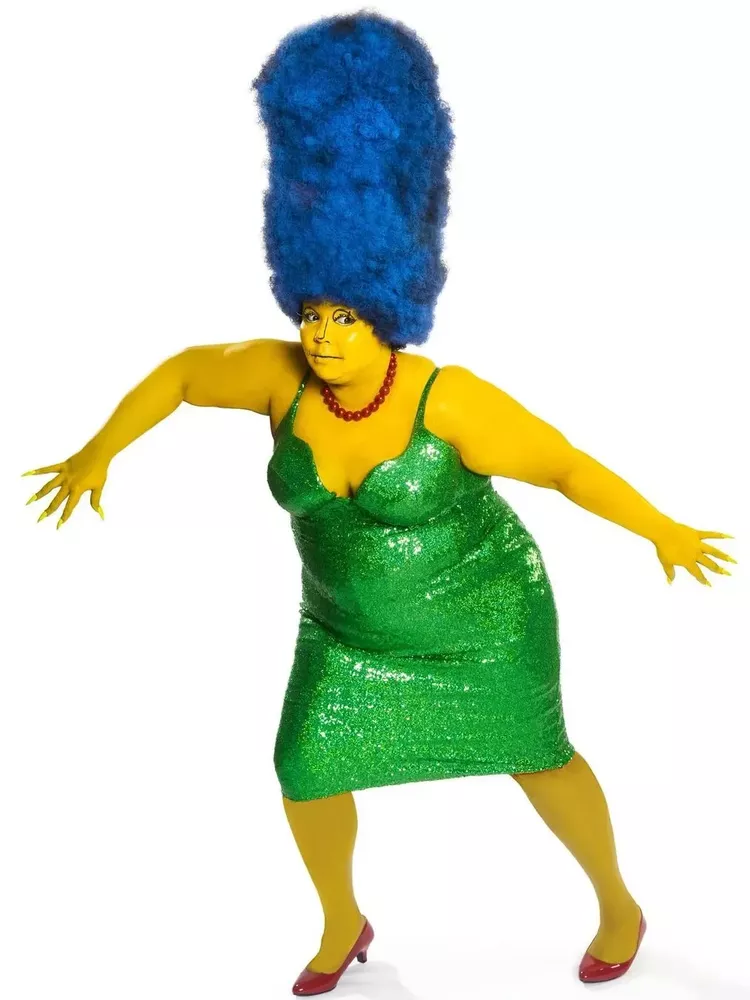 Lizzo’s dressed as Marge Simpson.  