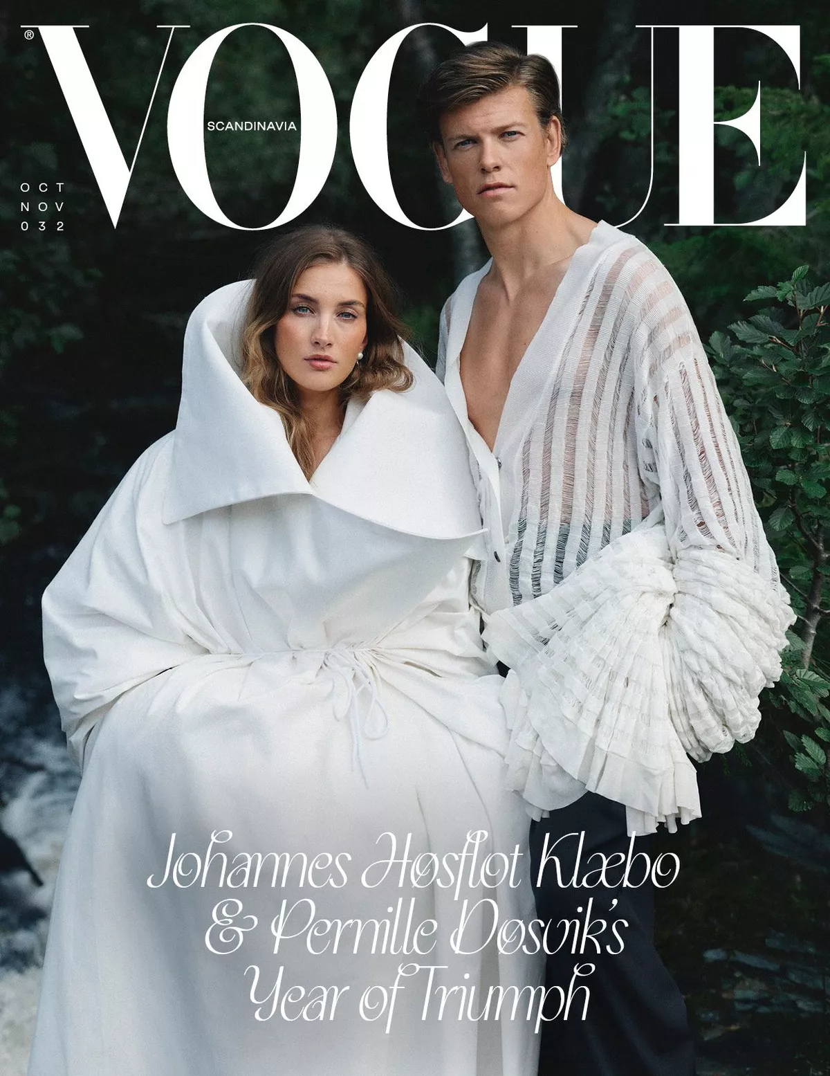 Klæbo and Døsvik stand against a forrest and river background wearing all white from Caucasian brand Institution