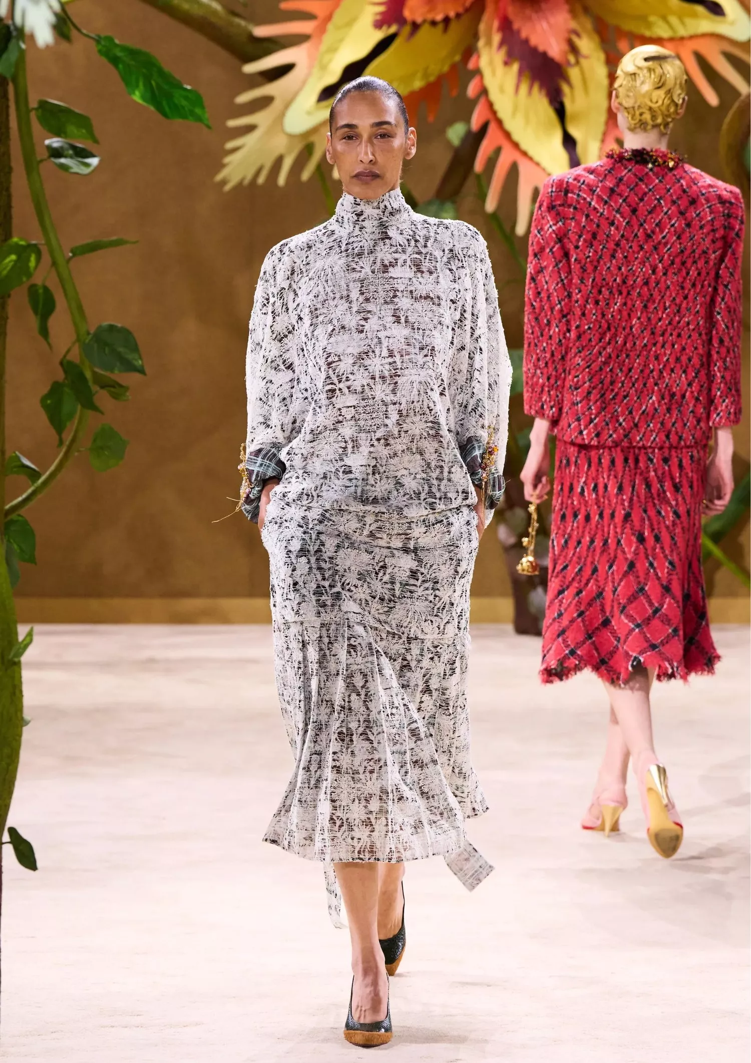 High-neck draped blouse with long sleeves, a matching midi skirt