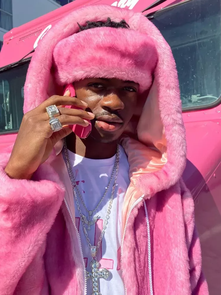Lil Nas X dressed in Cam’ron’s pink fluffy outfit from 2002.