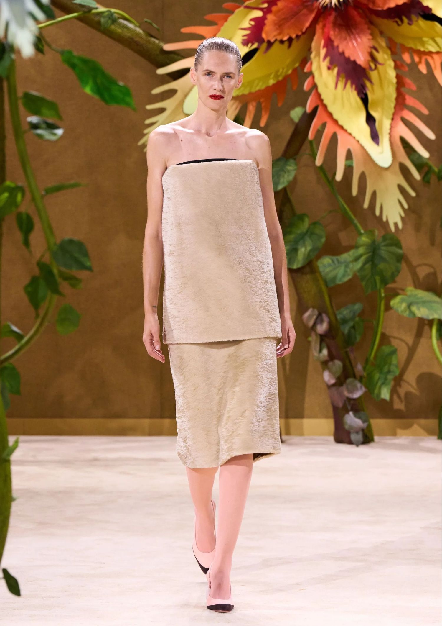 Beige set consisting of a bandeau top and a mid skirt