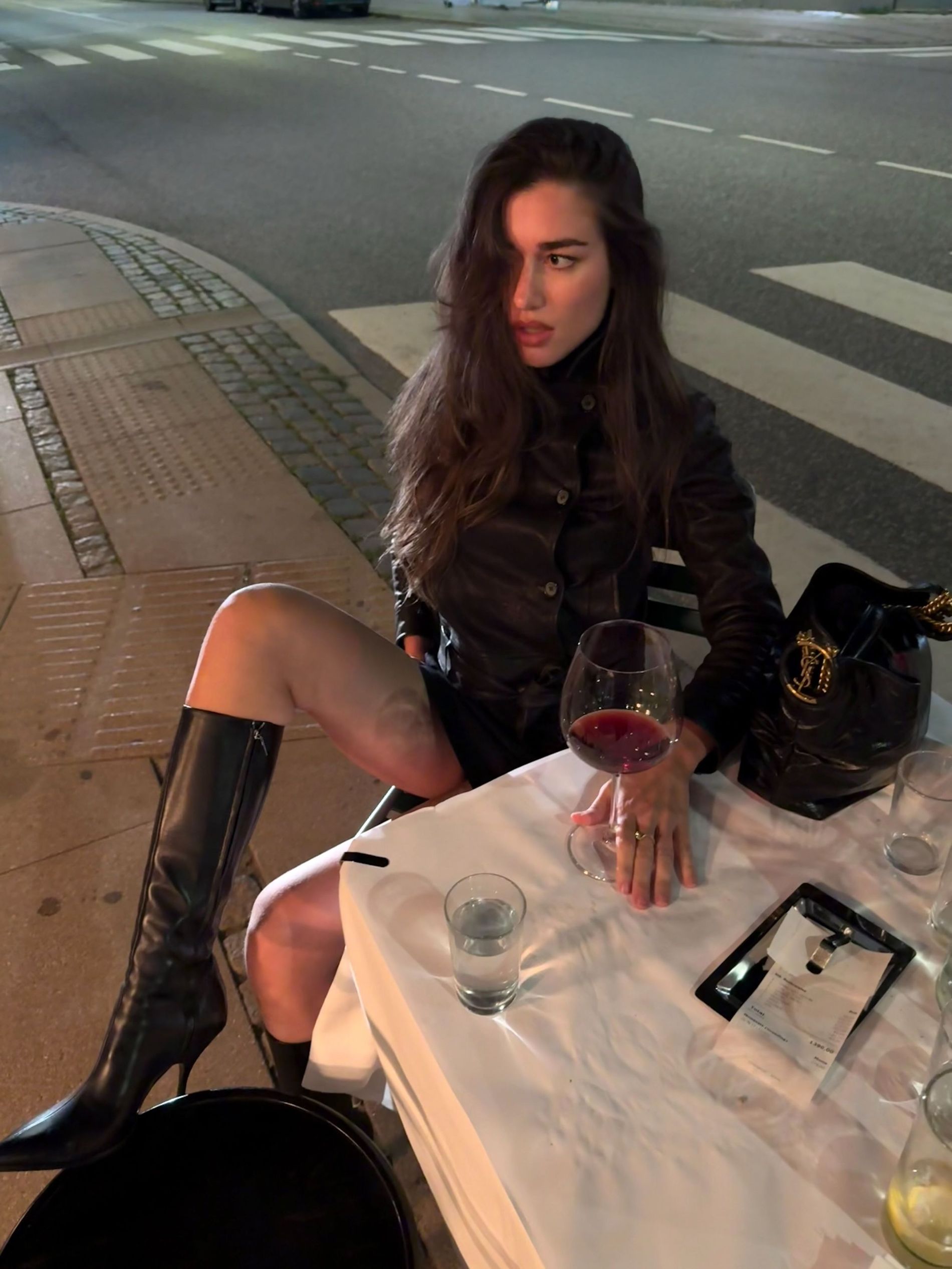 Ilirida wears all black outfit, YSL bag and Sania D'amina boots