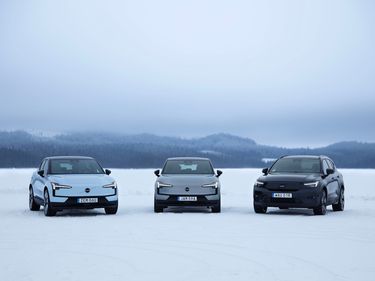 Three versions of the Volvo EX30 lined up on the ice track in Harads