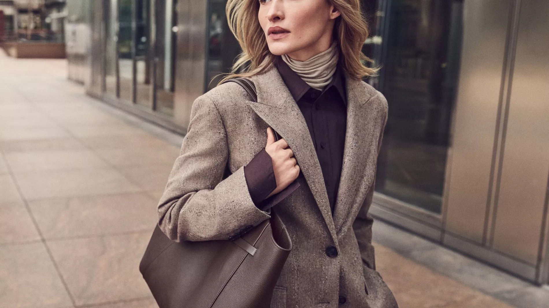 Model walking wearing the full Hugo Boss Fall Winter' 26 collection
