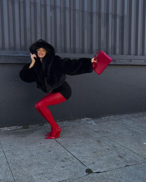 red dress black sheer tights How to wear the red stockings trend this Valentine's Day