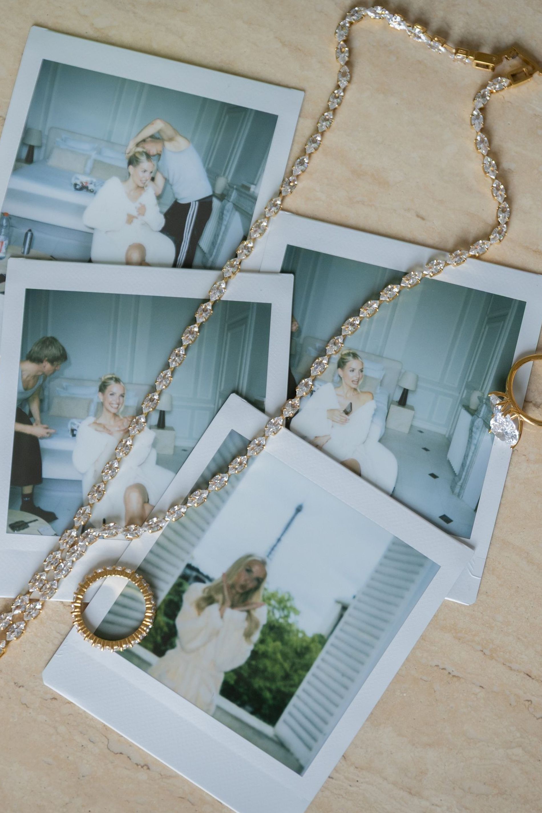 Polaroids of the shoot day in a Paris hotel room, intertwined with jewellery form the Leonie Hanne x Mockberg collection.