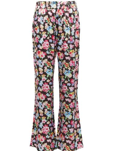 In full bloom: how to embrace florals in your winter wardrobe - Vogue ...