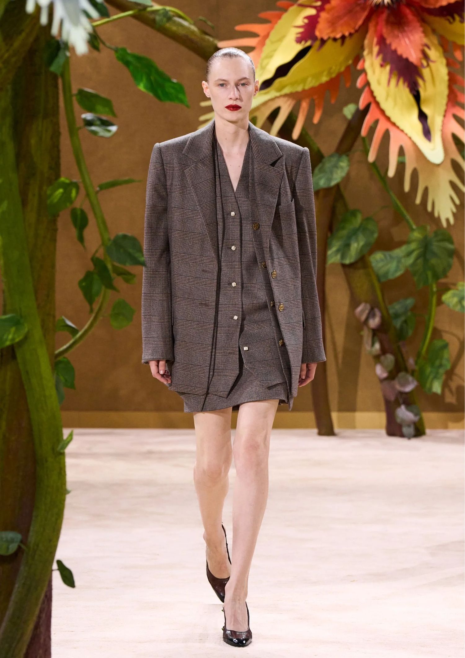 Grey blazer with matching shirt and mini skirt