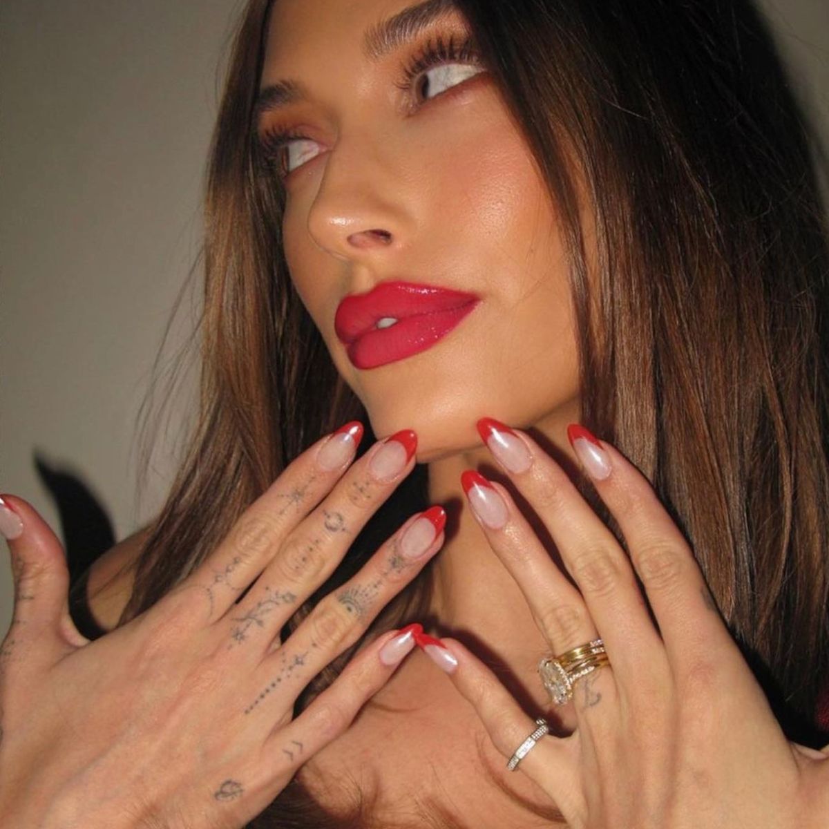 Hailey Bieber opts for a red French tip and matching lipstick for Valentine's Day