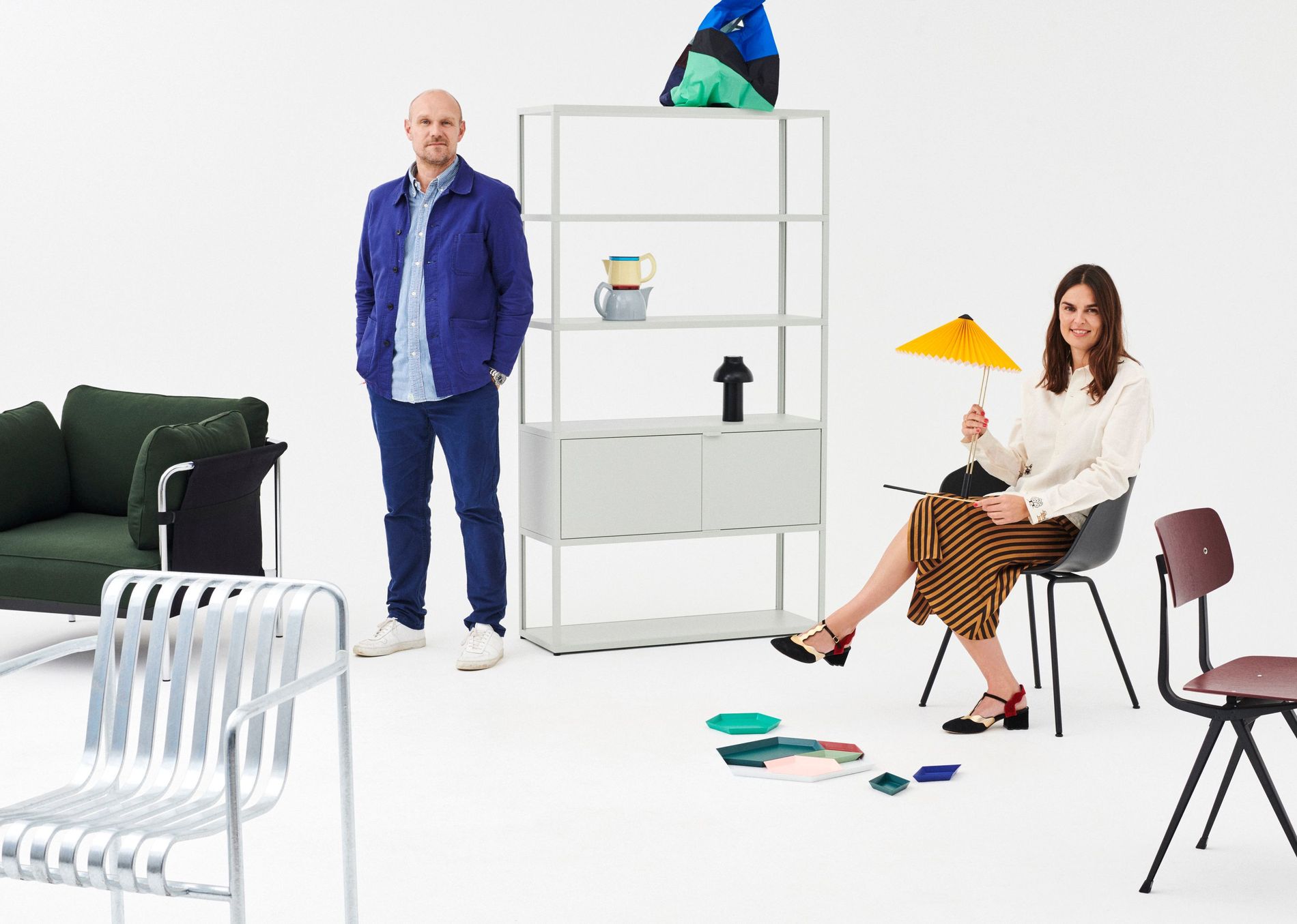 Mette and Rolf Hay surrounded by some of their furniture designs