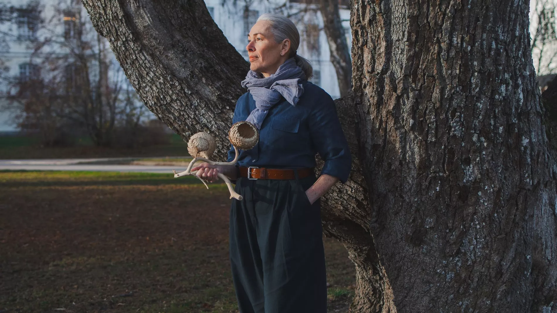 A woman standing in a park