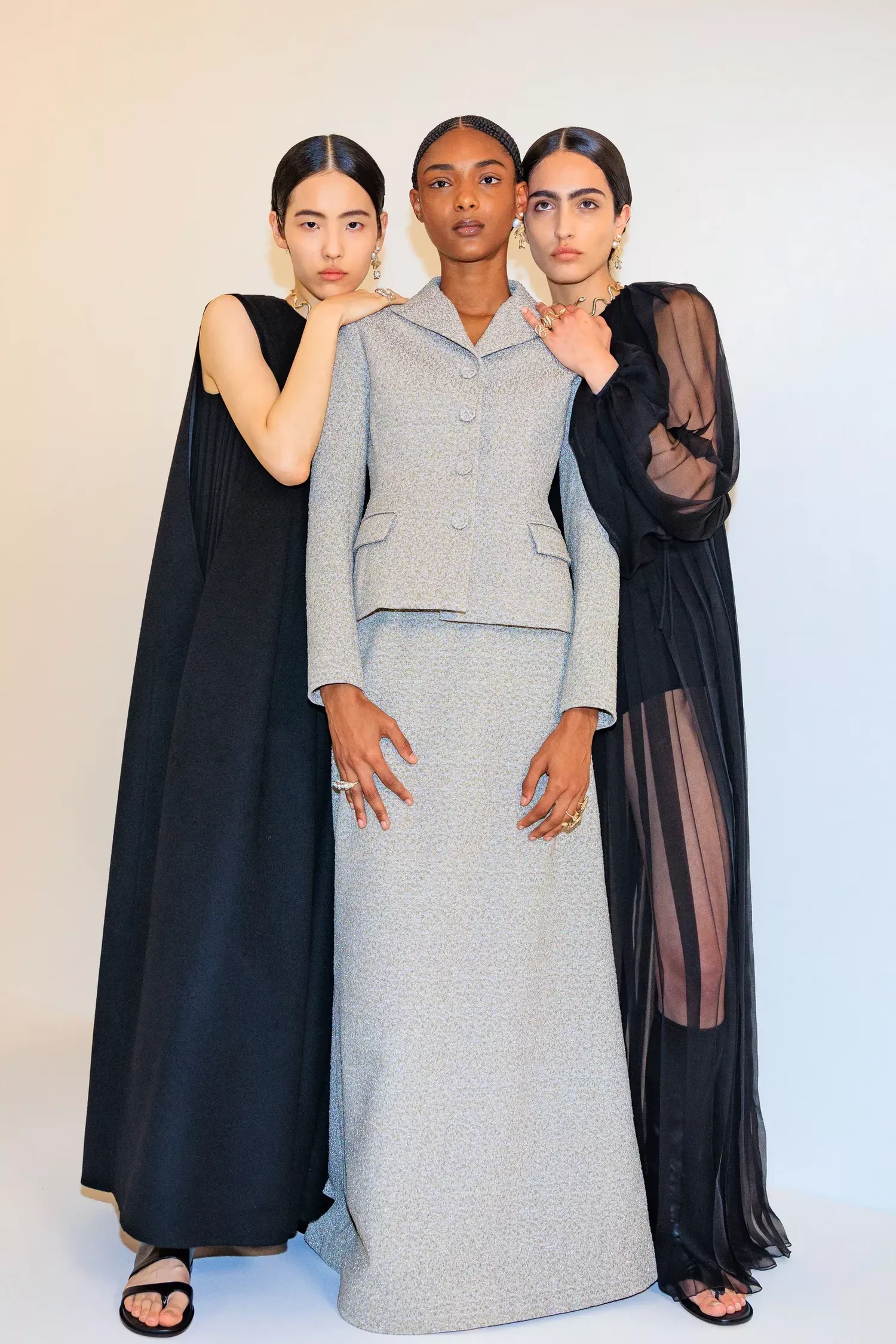 A trio of models backstage at Christian Dior haute couture AW23