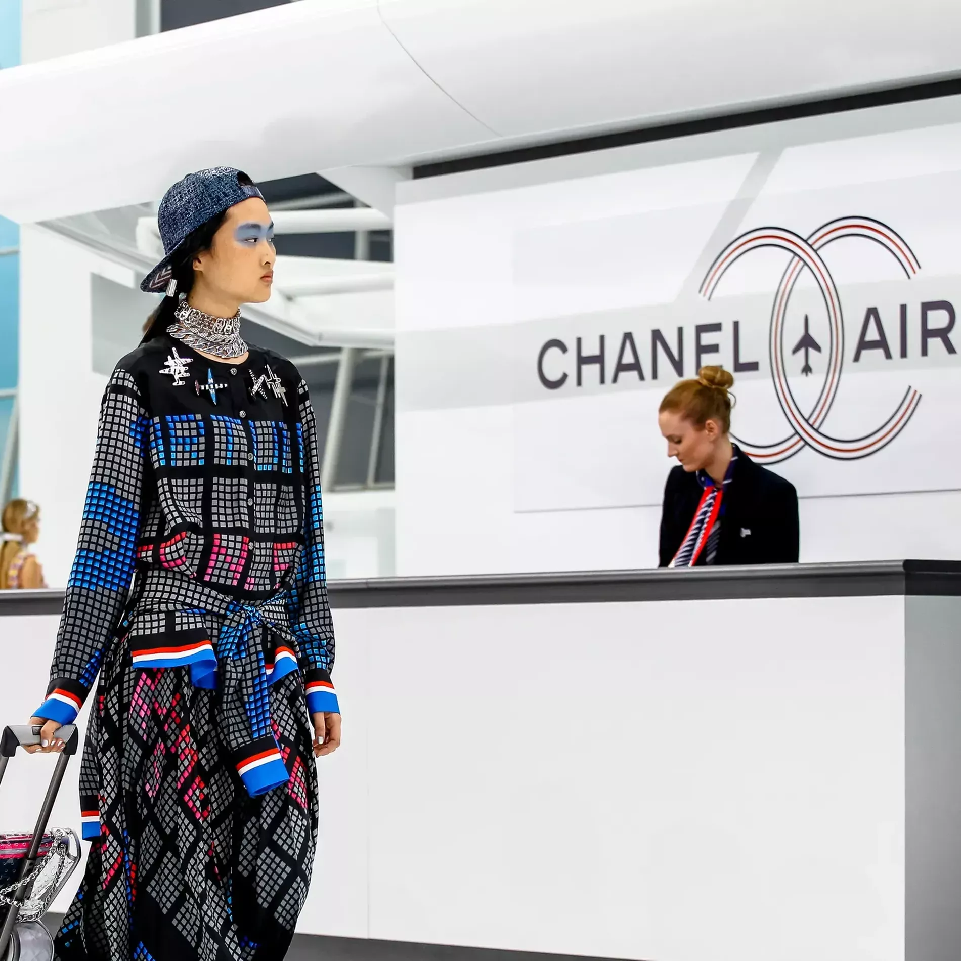 Model walks on the airport runway of Chanel in 2016