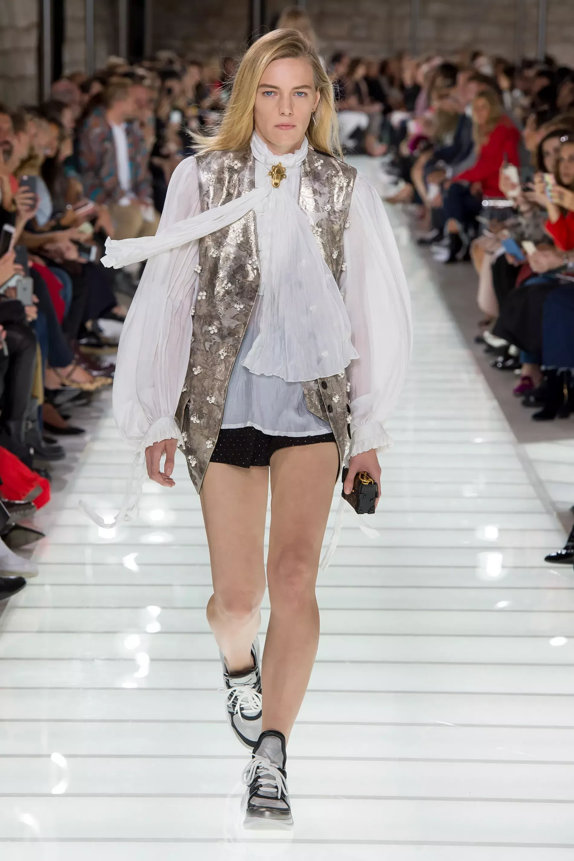 A Model walks down the catwalk during the Louis Vuitton Spring