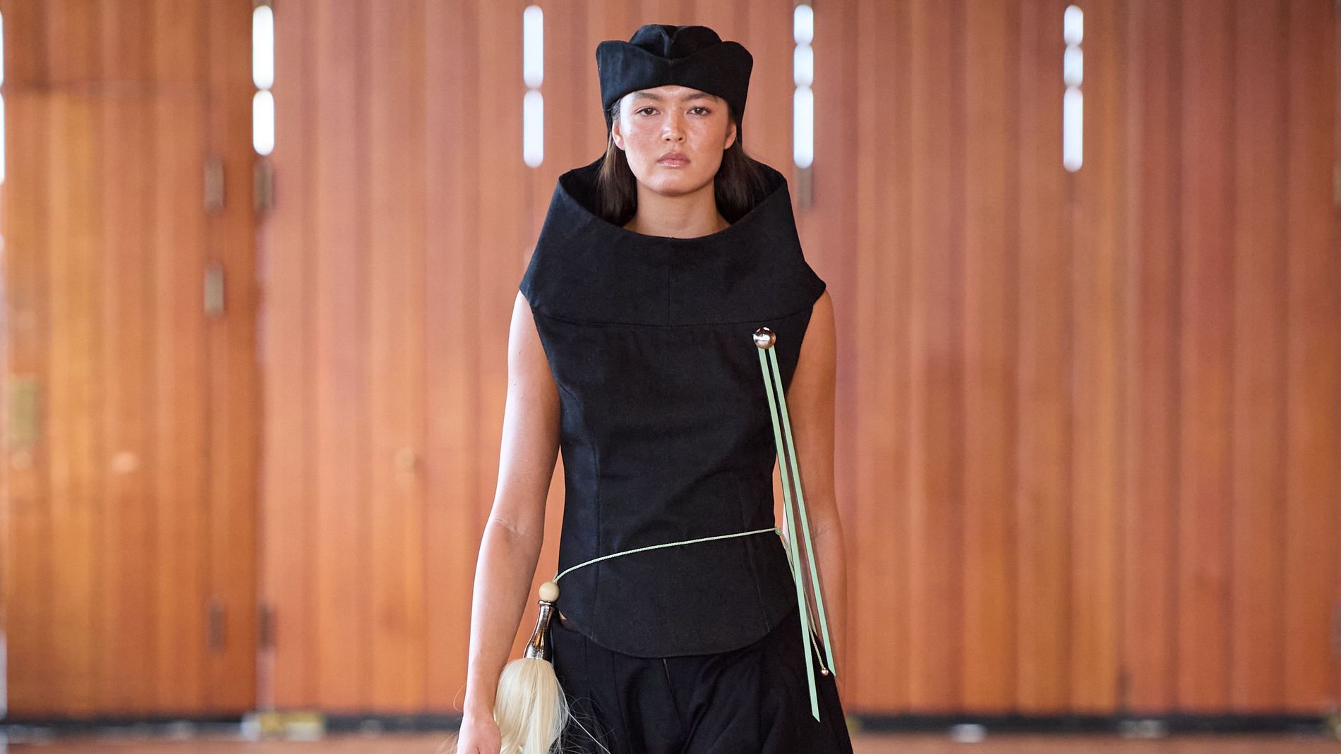 Model walking the Swedish School of Textiles show