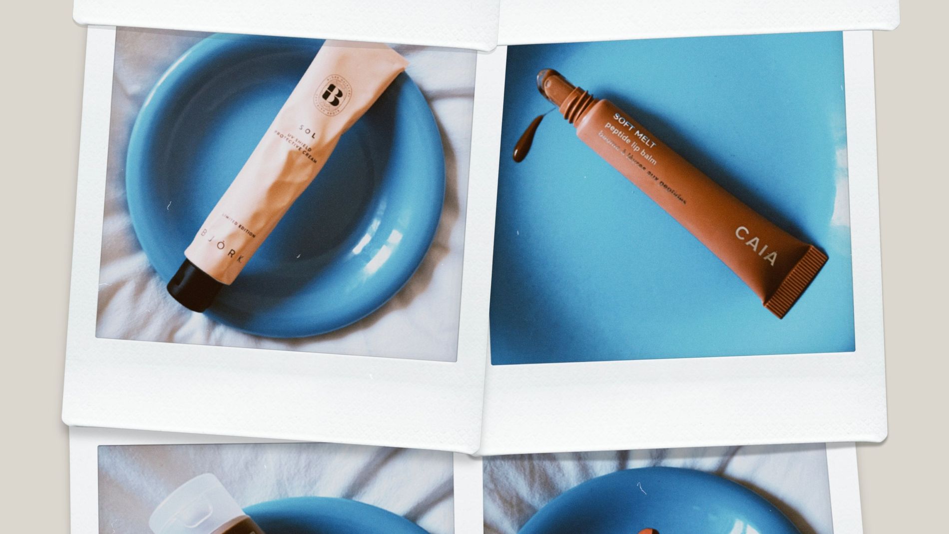 Polaroid photos of Nilen's Jord Hydra Sun SPF50 lotion, Björn Axen's volume mousse, Caia's soft melt lip treatment, Tanrevel's bronzing serum and Westman Atelier's tinted lip balm on a chubby blue plat on white sheets
