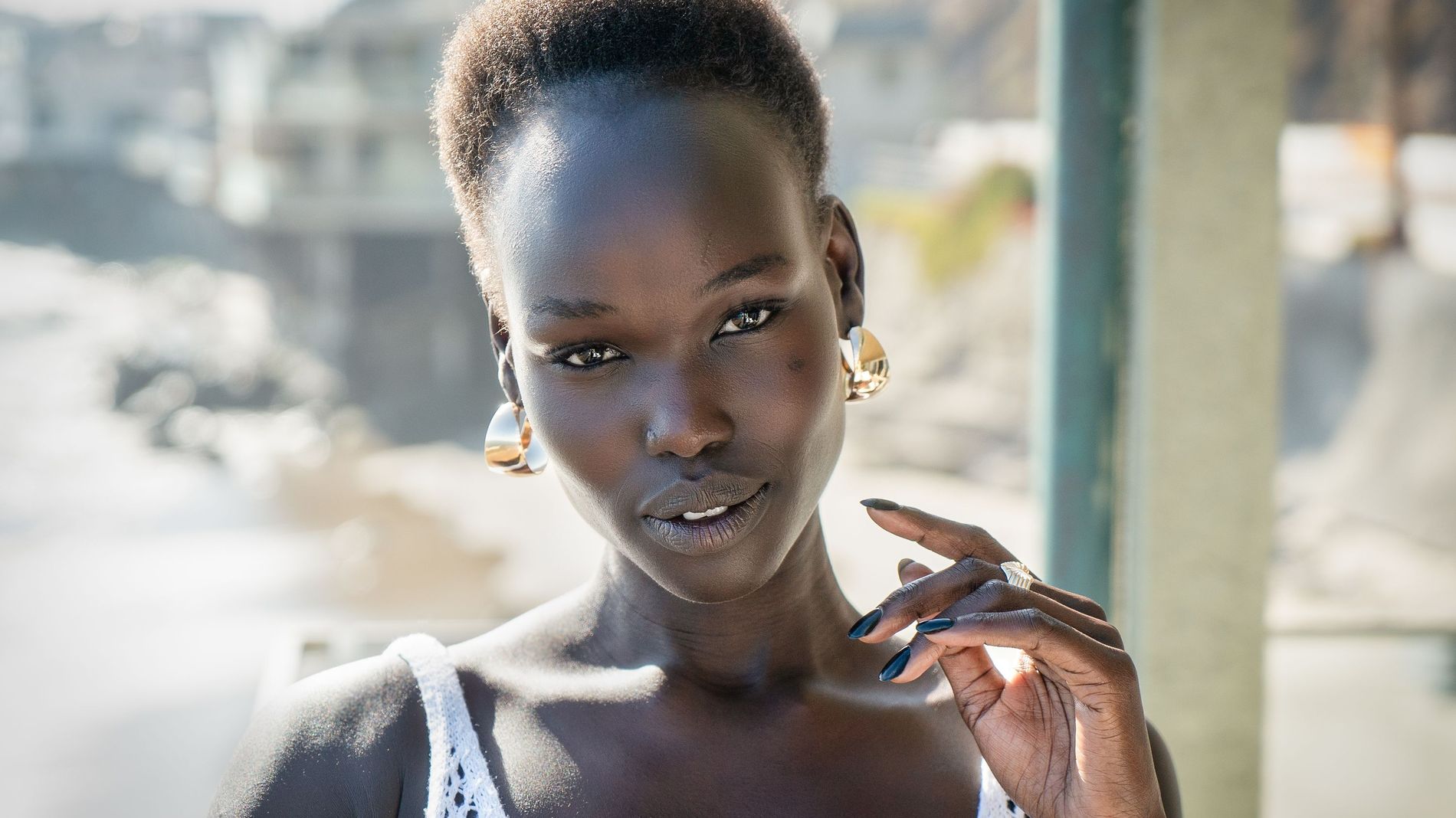 Woman facing the camera outside