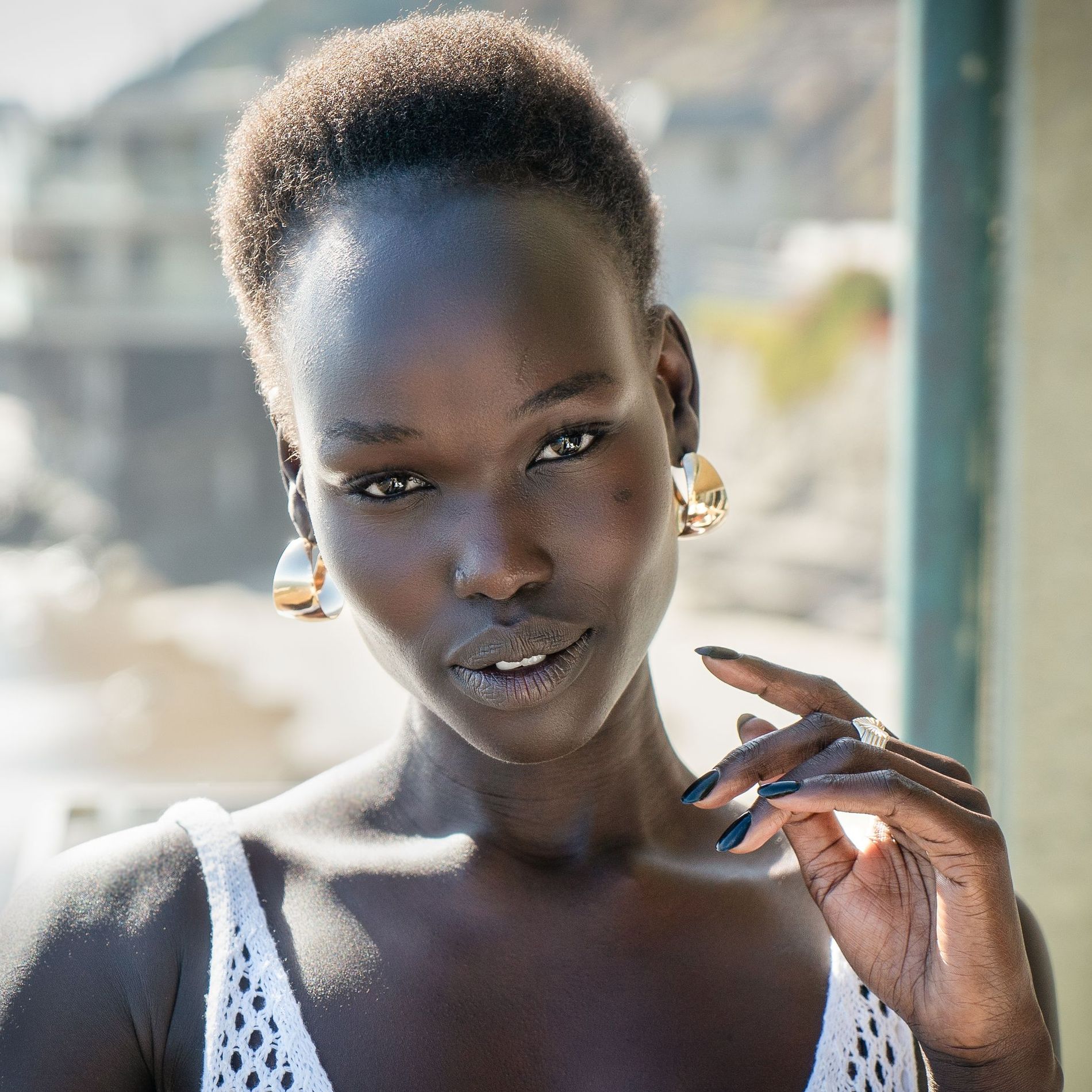 Woman facing the camera outside
