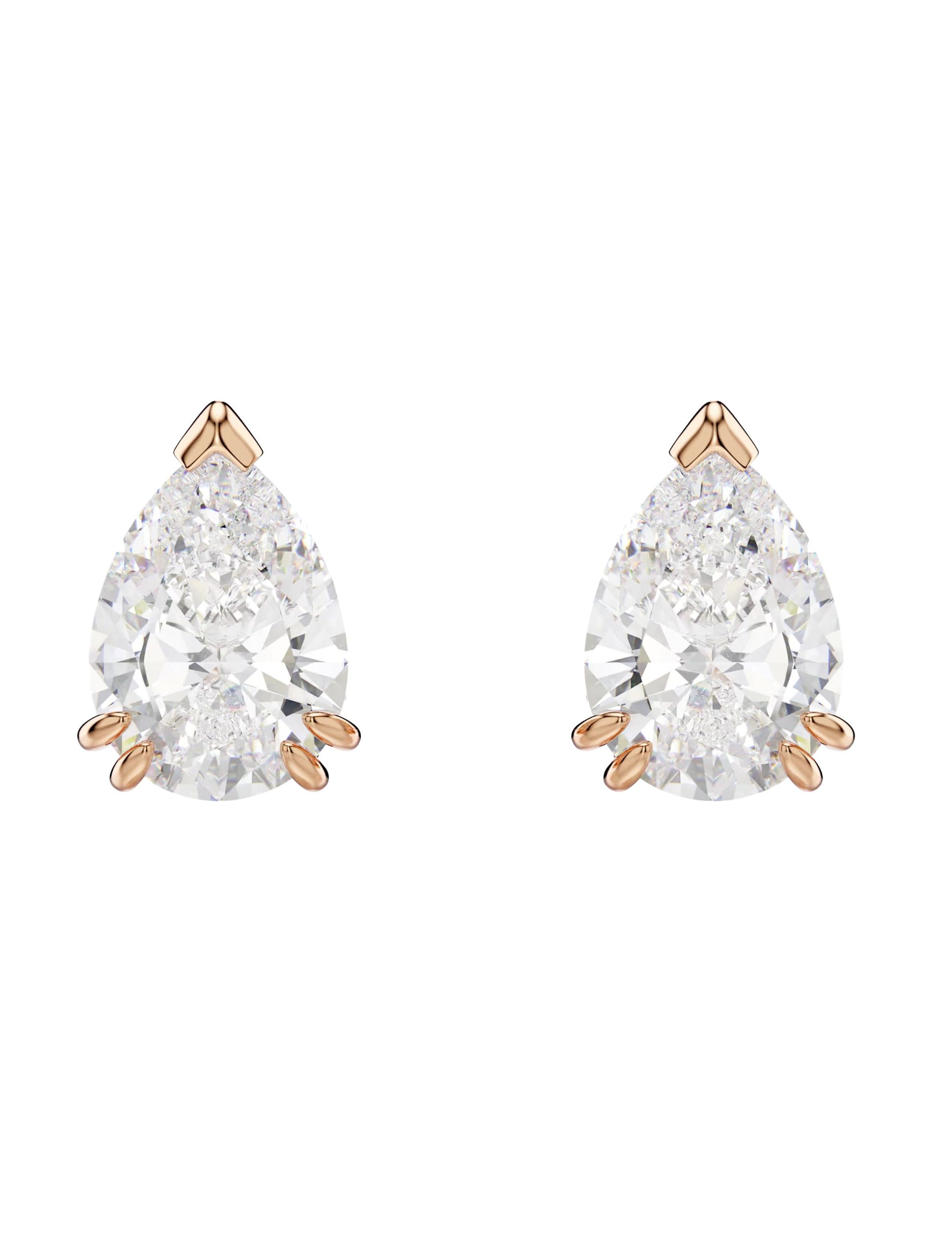 Pear cut crystal earrings from Swarovski against a white background